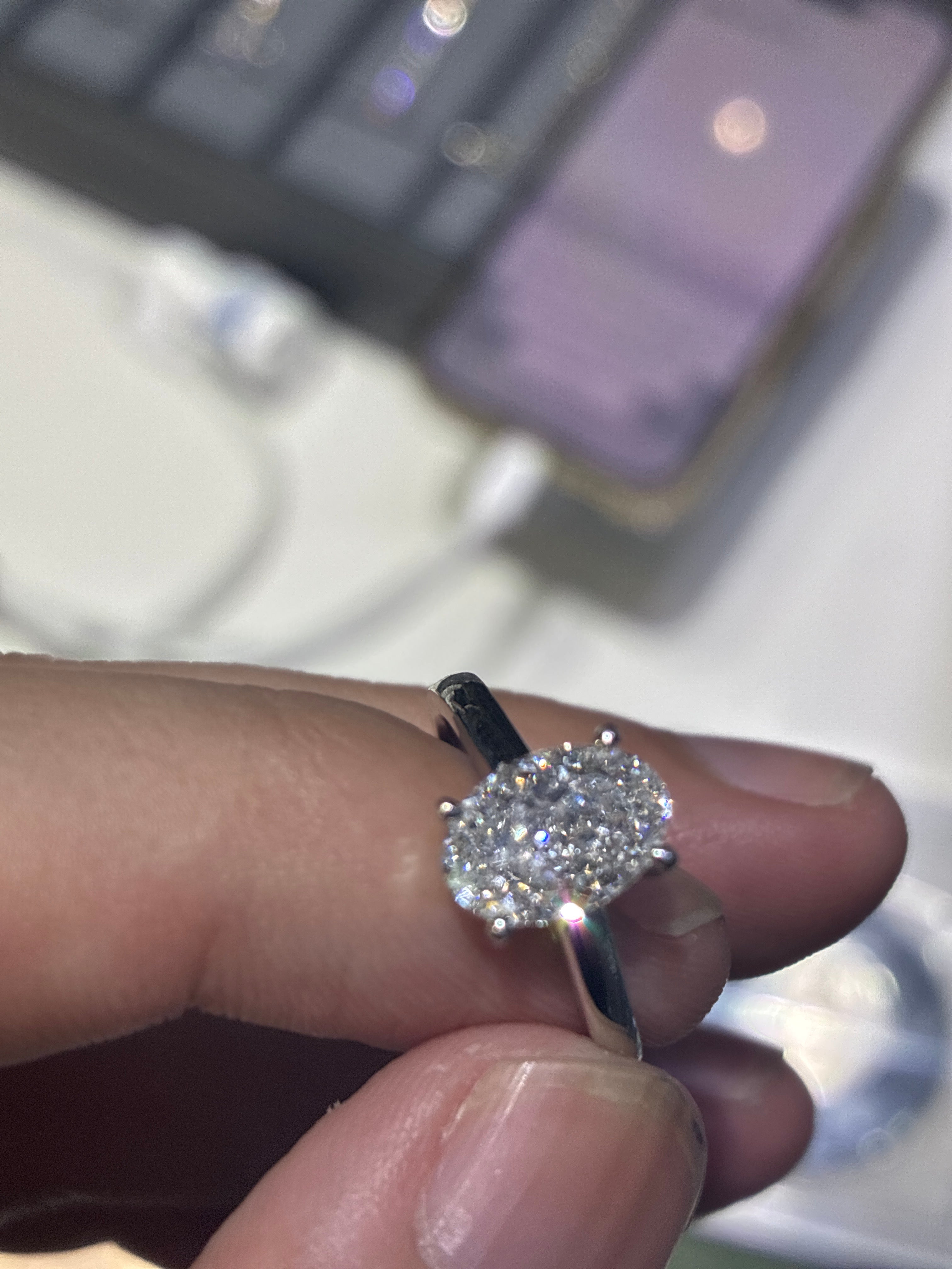 Judie pay for (18k gold, 2 carat oval diamond ring)