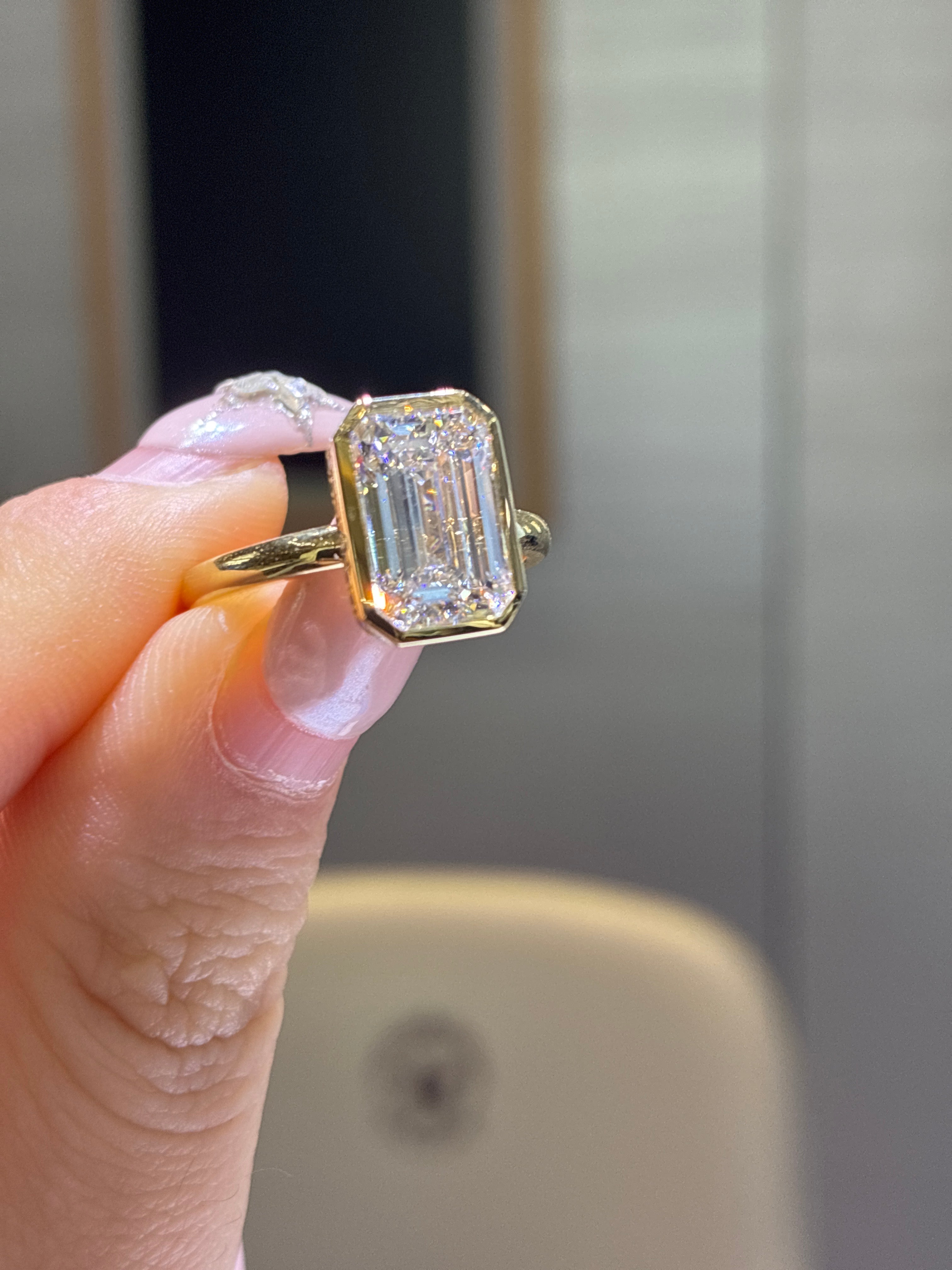 For sam 14k gold bezel emerald cut ring total 3.178