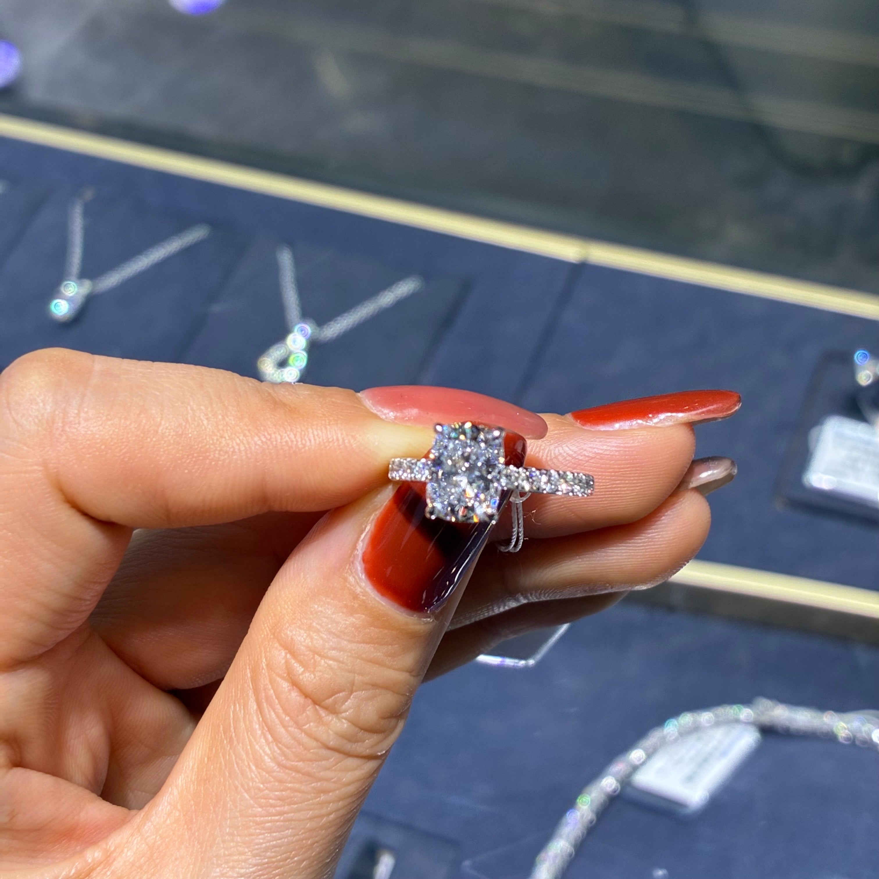 2.04ct Elongated cushion with 0.44 side stone