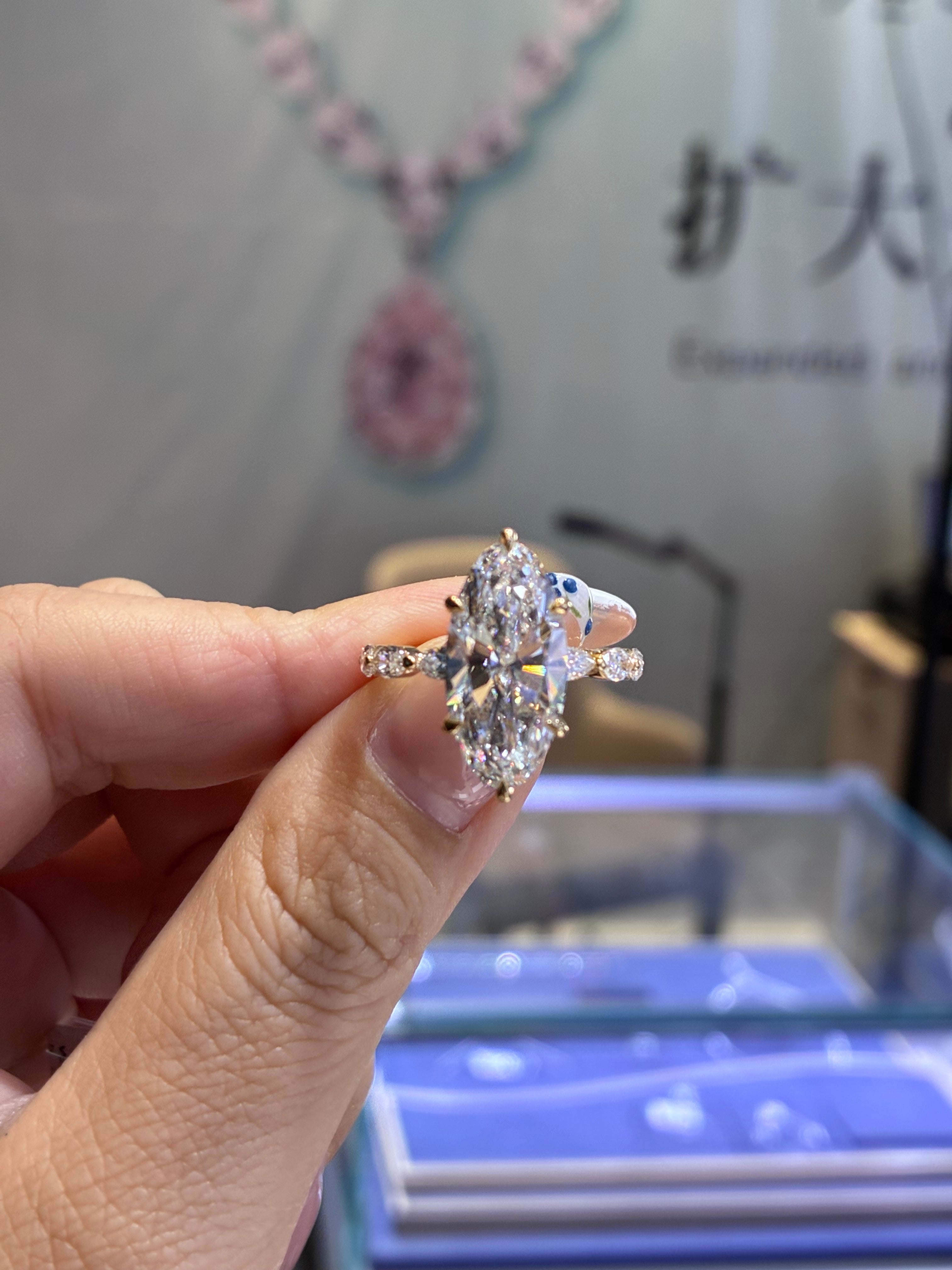 For Bless, deposit for 5ct Moval, E/VS1 with 1ct sidestones in 14k yellow gold