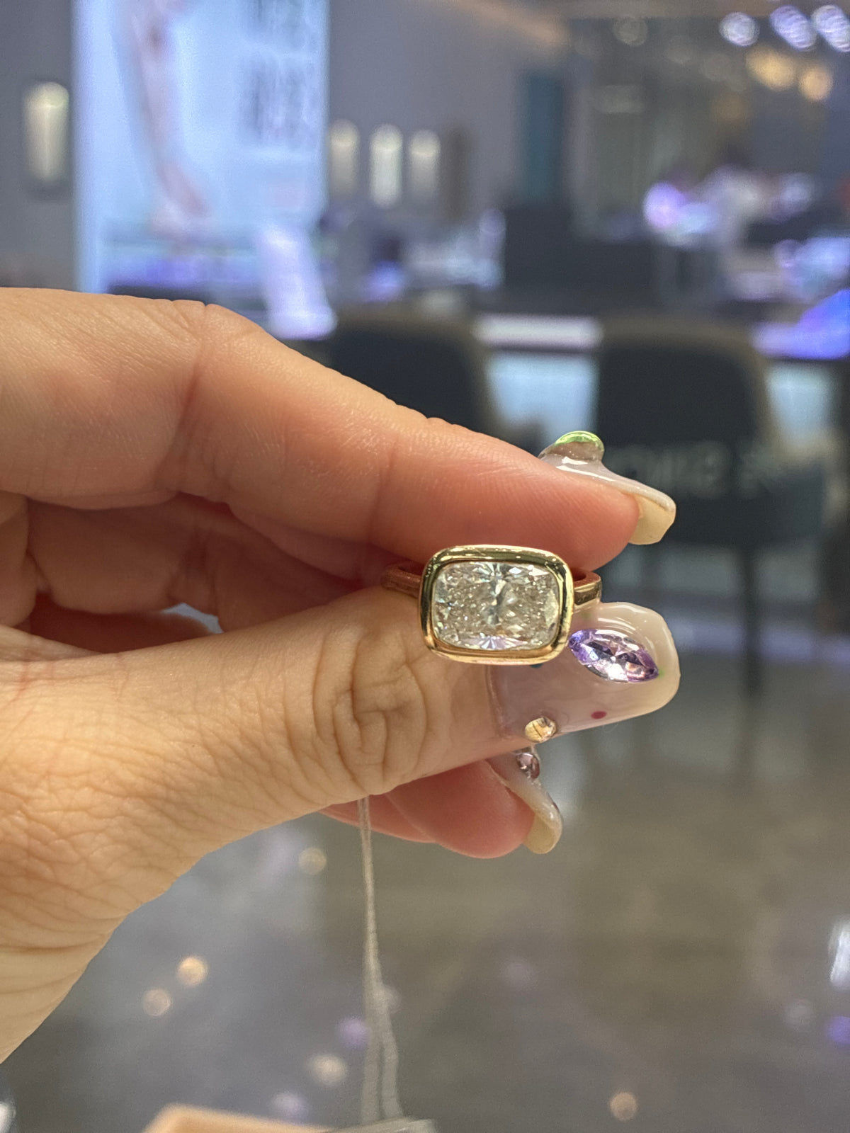 For Kim Vottero, 3ct bezel radiant, 14k,E/VS1