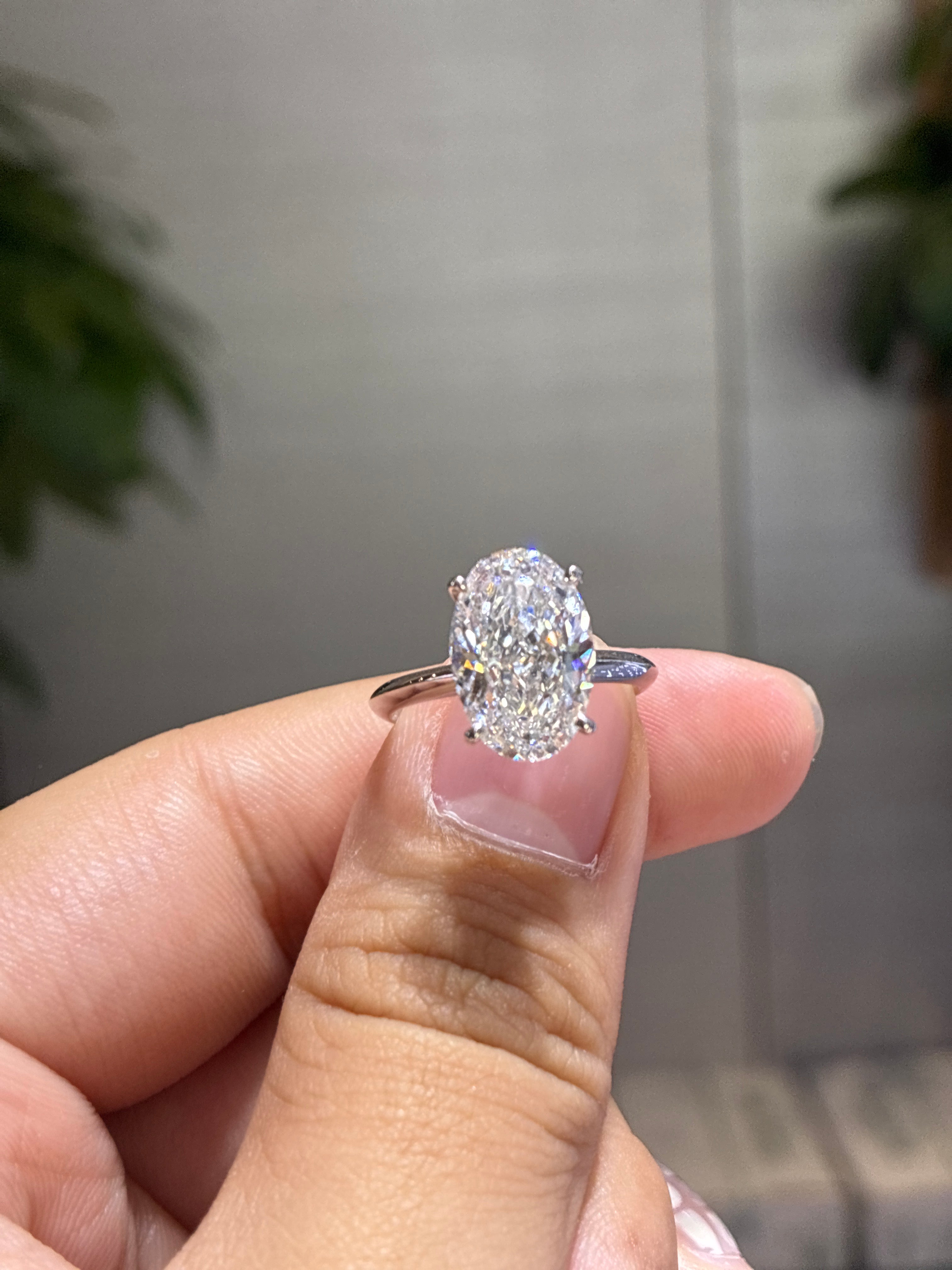 For Sara 18k White Gold Oval Cut Solitary 5.05ct E/ VVS2