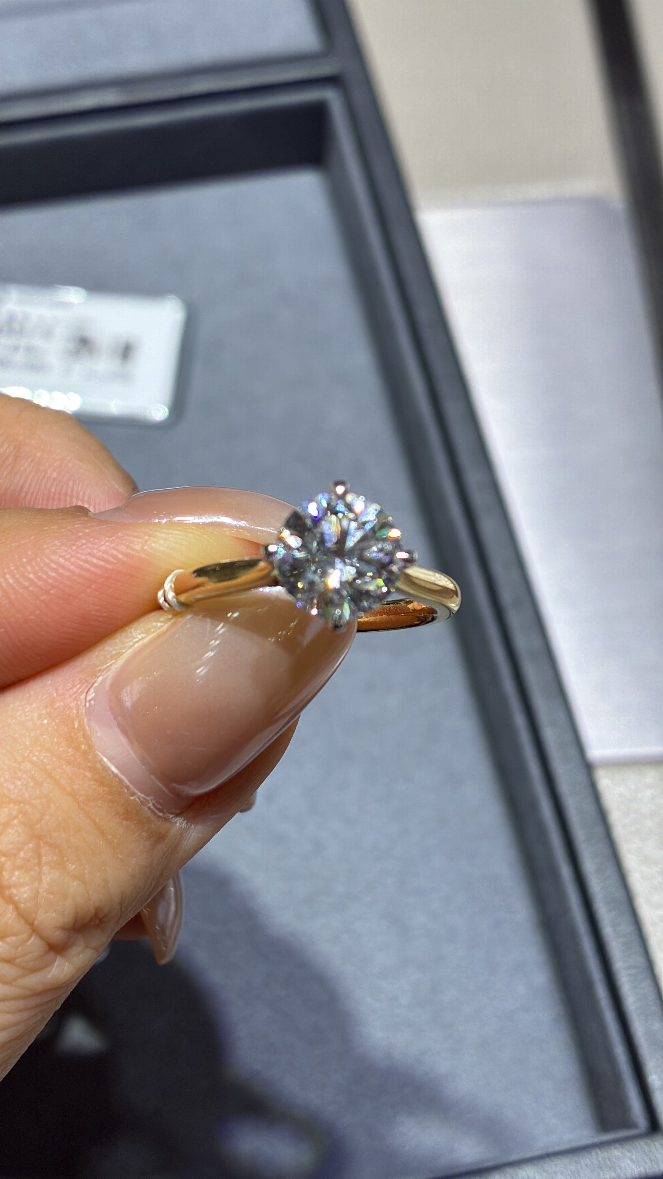 For Natia, custom 14K Gold 1.5ct Round Two tone cathedral setting with diamond on bridge, half pave band, compass prongs, E/VS1