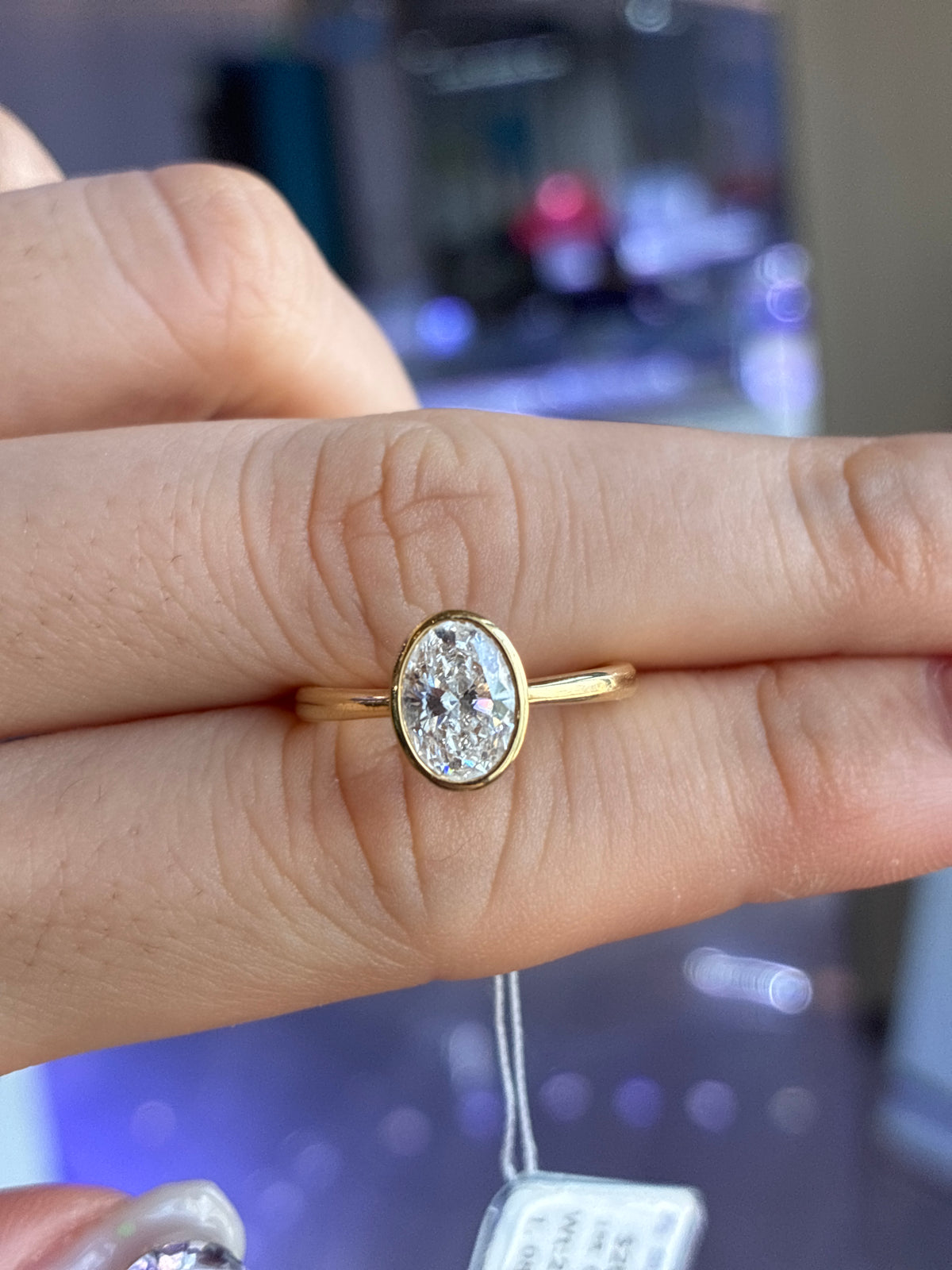 Deposit for Chocolatelnk, EastWest white oval bezel ring, 14k yellow gold, size8
