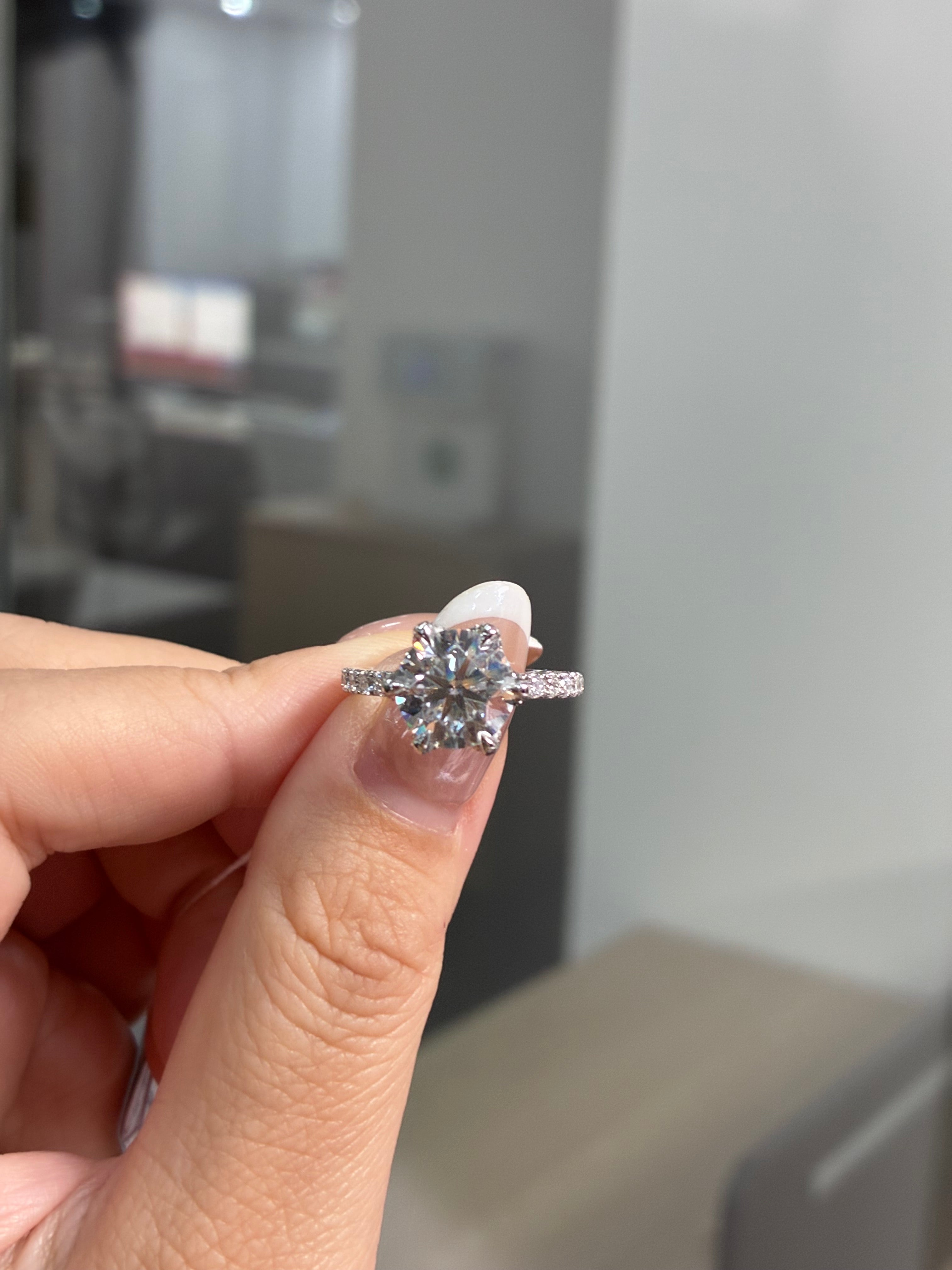 For Jana, 3.02ct Round mainstone with 0.95ct sidestones, D/VVS2, in 14k white gold
