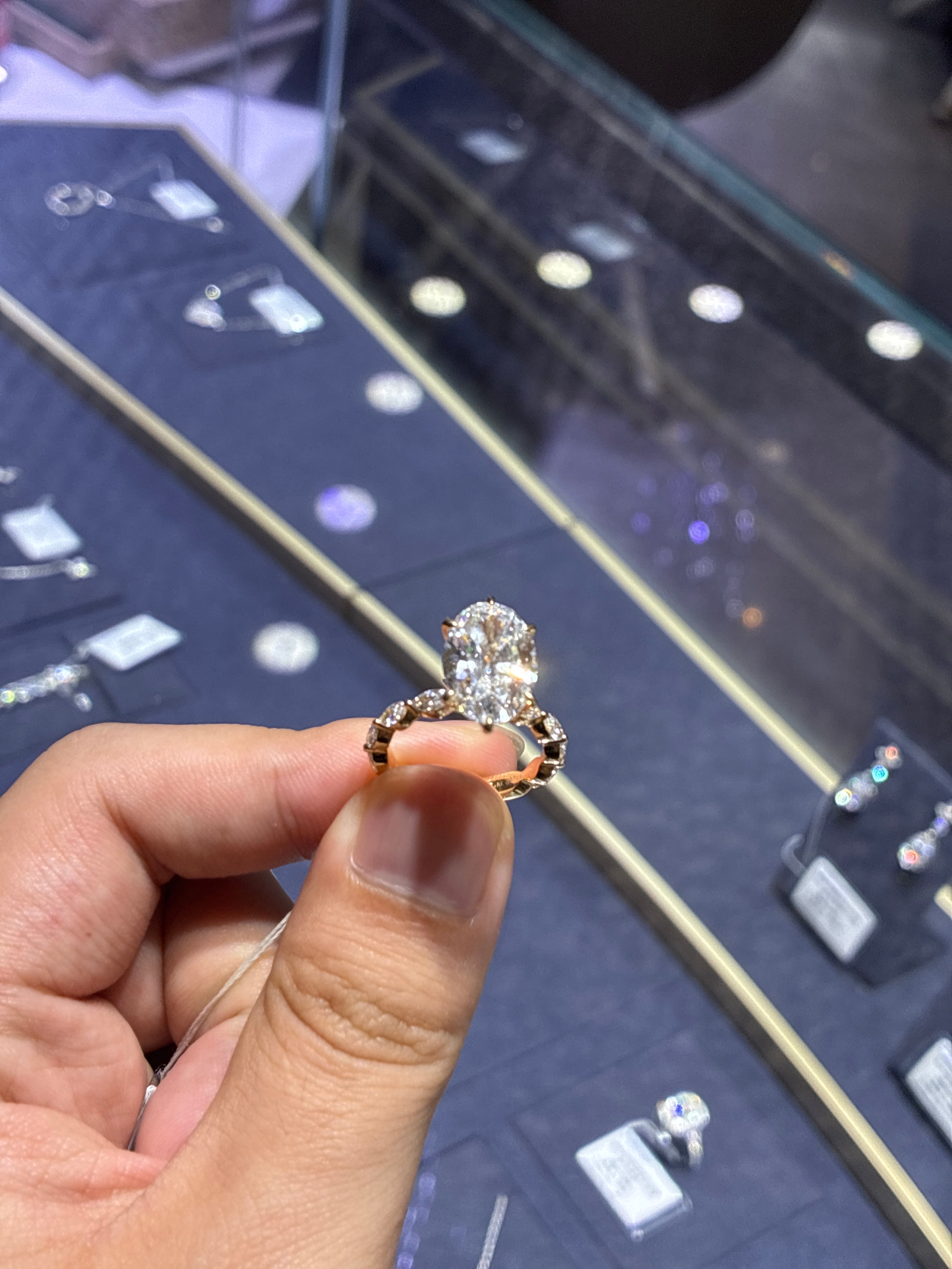 For Nina Navarro, This ring is 18k white gold main stone oval cut 5.01ct E/VS1 side stone 0.897ct Customize