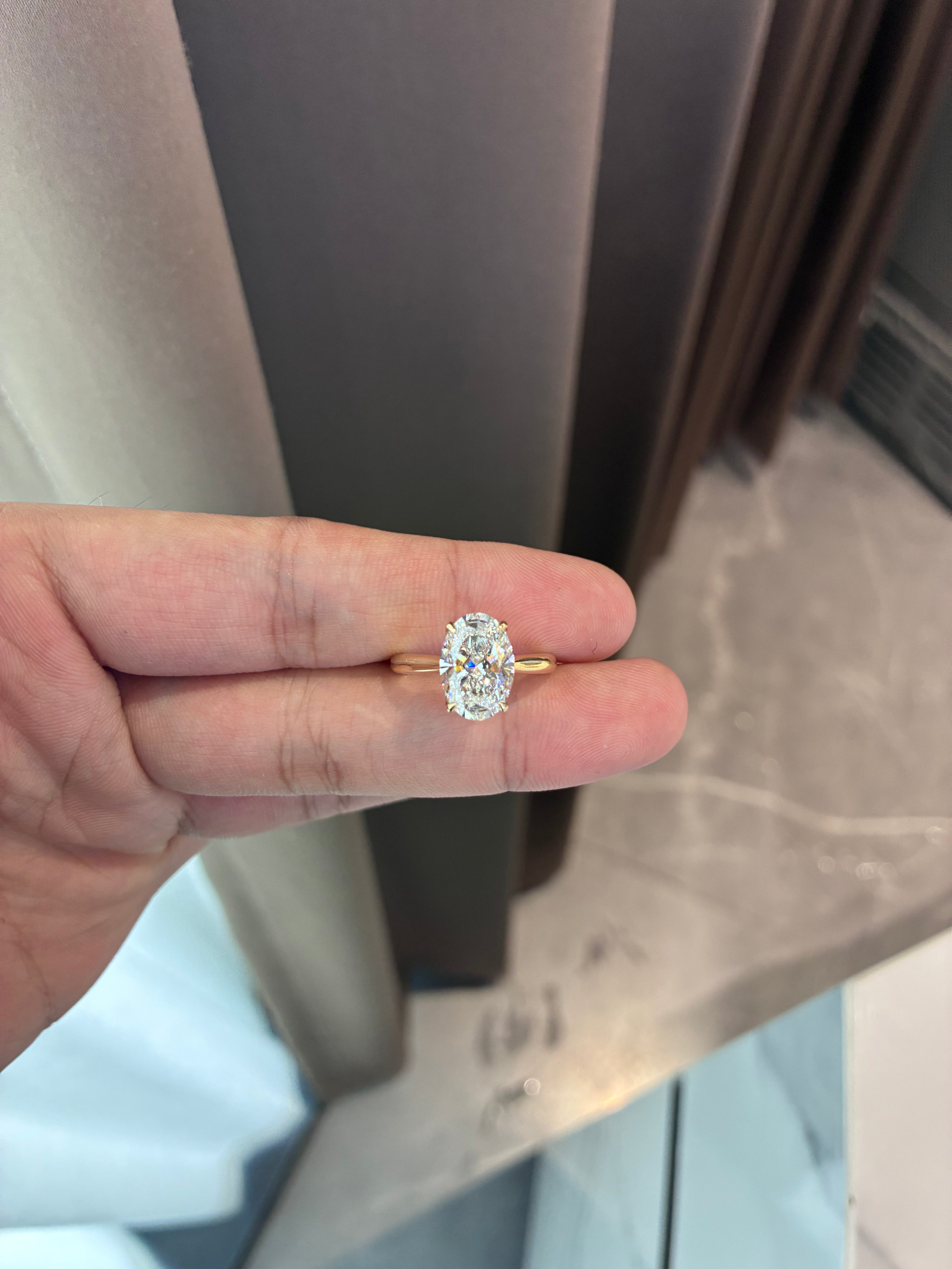 For daria 14k yellow gold ring with 3.03ct main diamond And 0.113ct side diamonds
