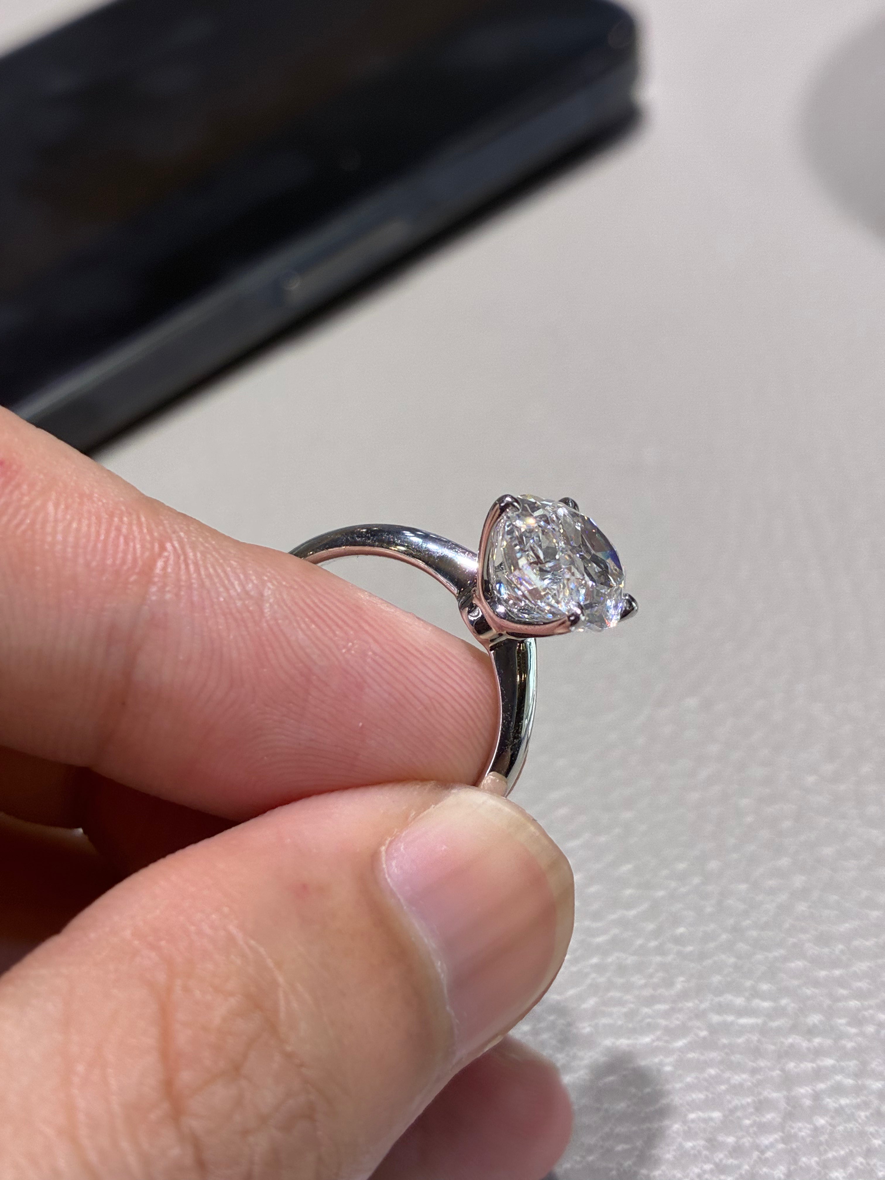 Terry doll for pay (18 white gold, 5 carat E/vvs2 oval diamond ring)