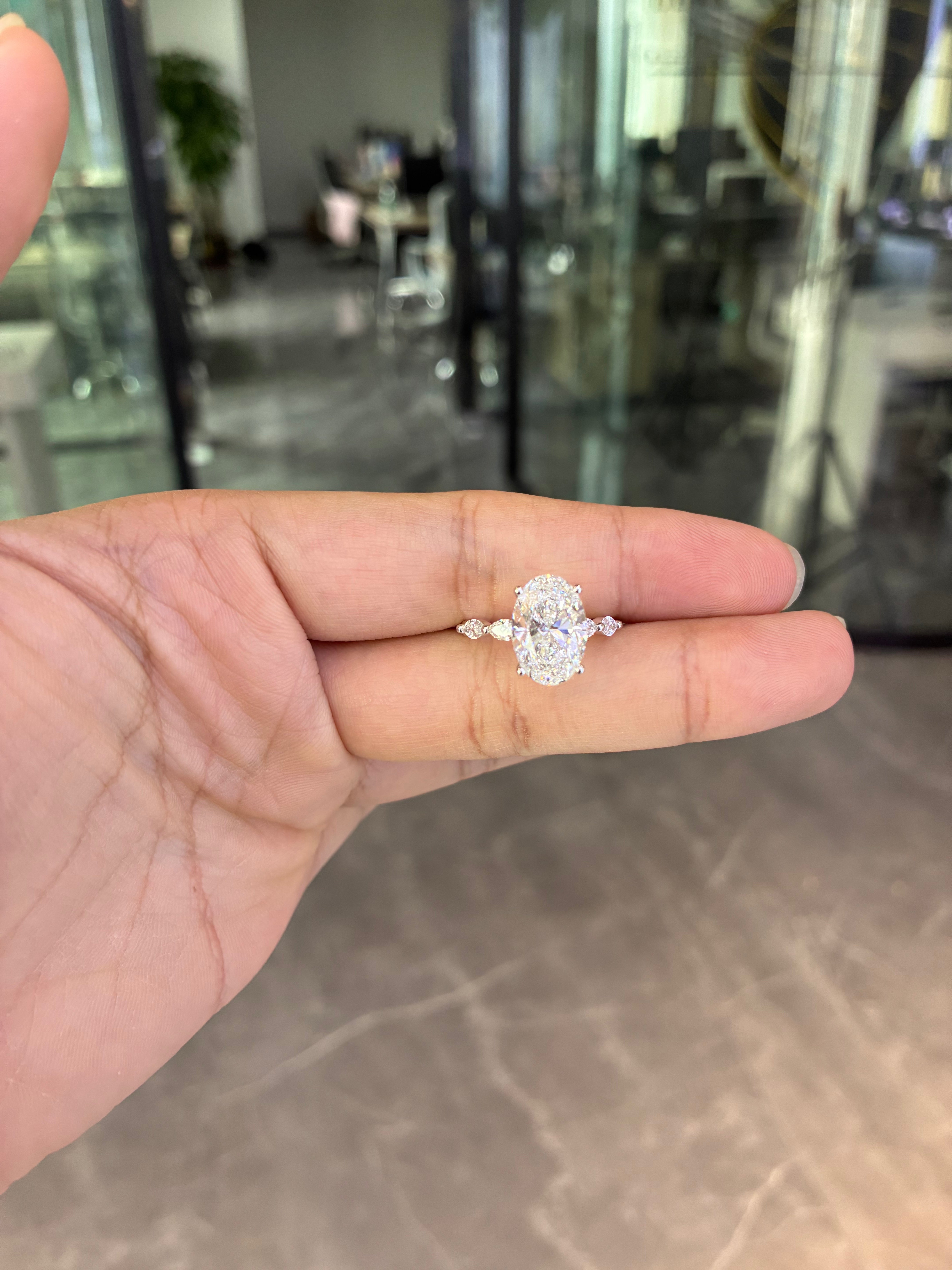 For Syd 14k white gold ring with 4ct D vvs2 oval diamond And 0.579ct side stones