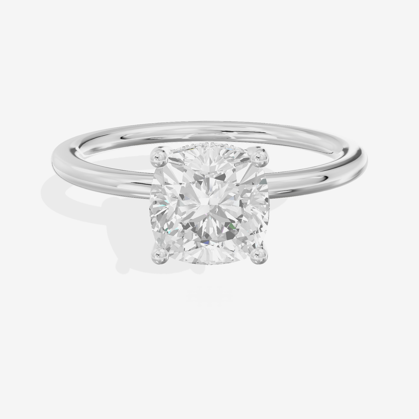 Reverya Hidden Halo Cushion Engagement Ring (1/20 ct. tw.) in Platinum
