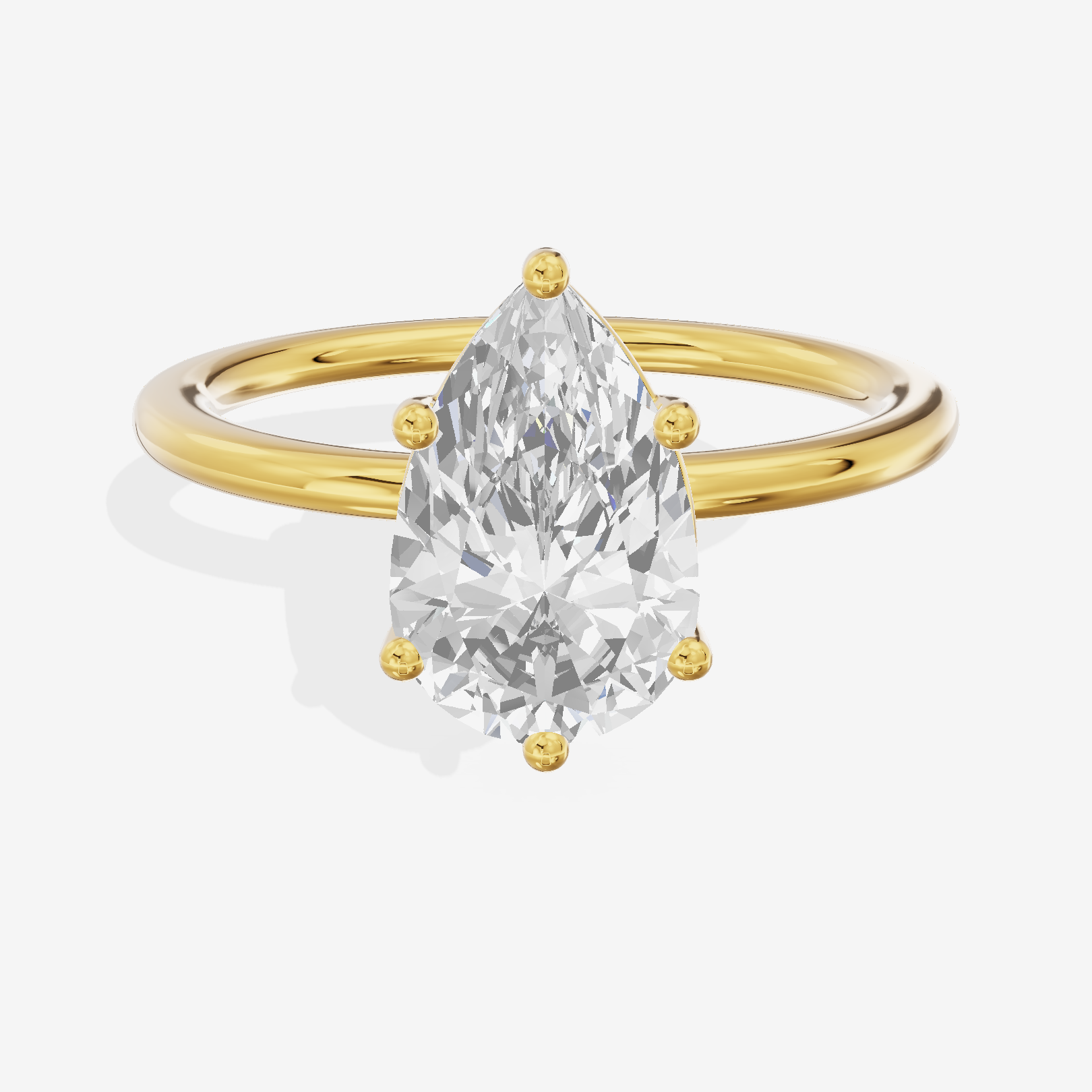 Crowned Vowsae 1.5mm Pear Solitaire Engagement Ring in 18K Yellow Gold
