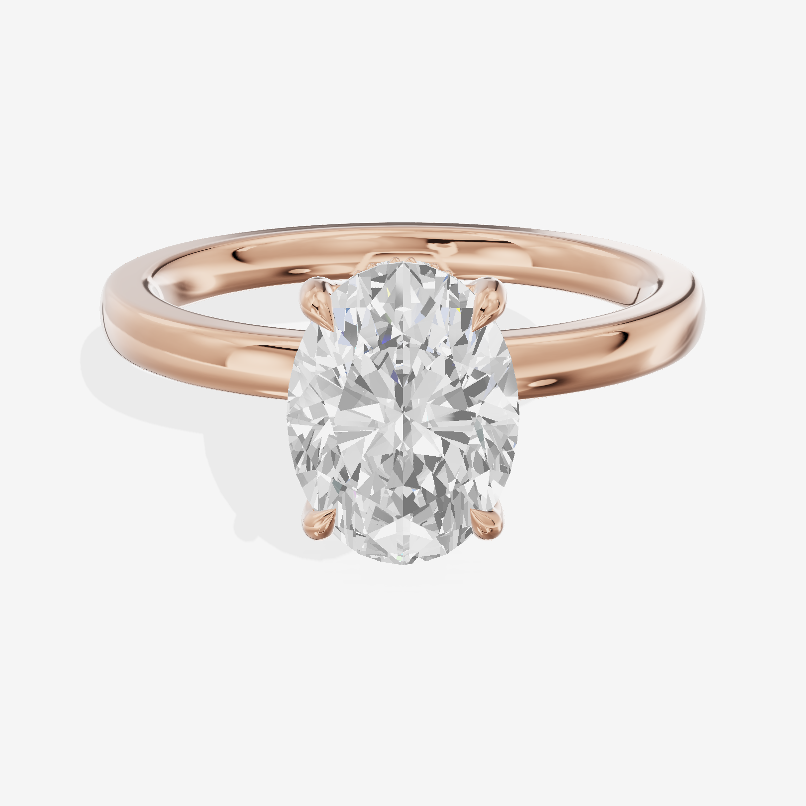 Crowned Whisper Oval Hidden Halo Engagement Ring in 14K Rose Gold