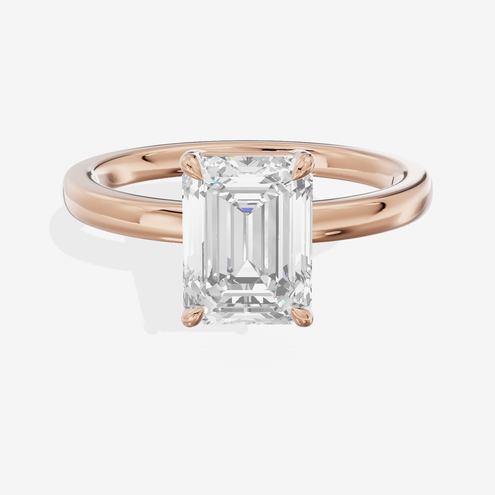 Heartline 2mm Emerald Solitaire Engagement Ring in 14K Rose Gold