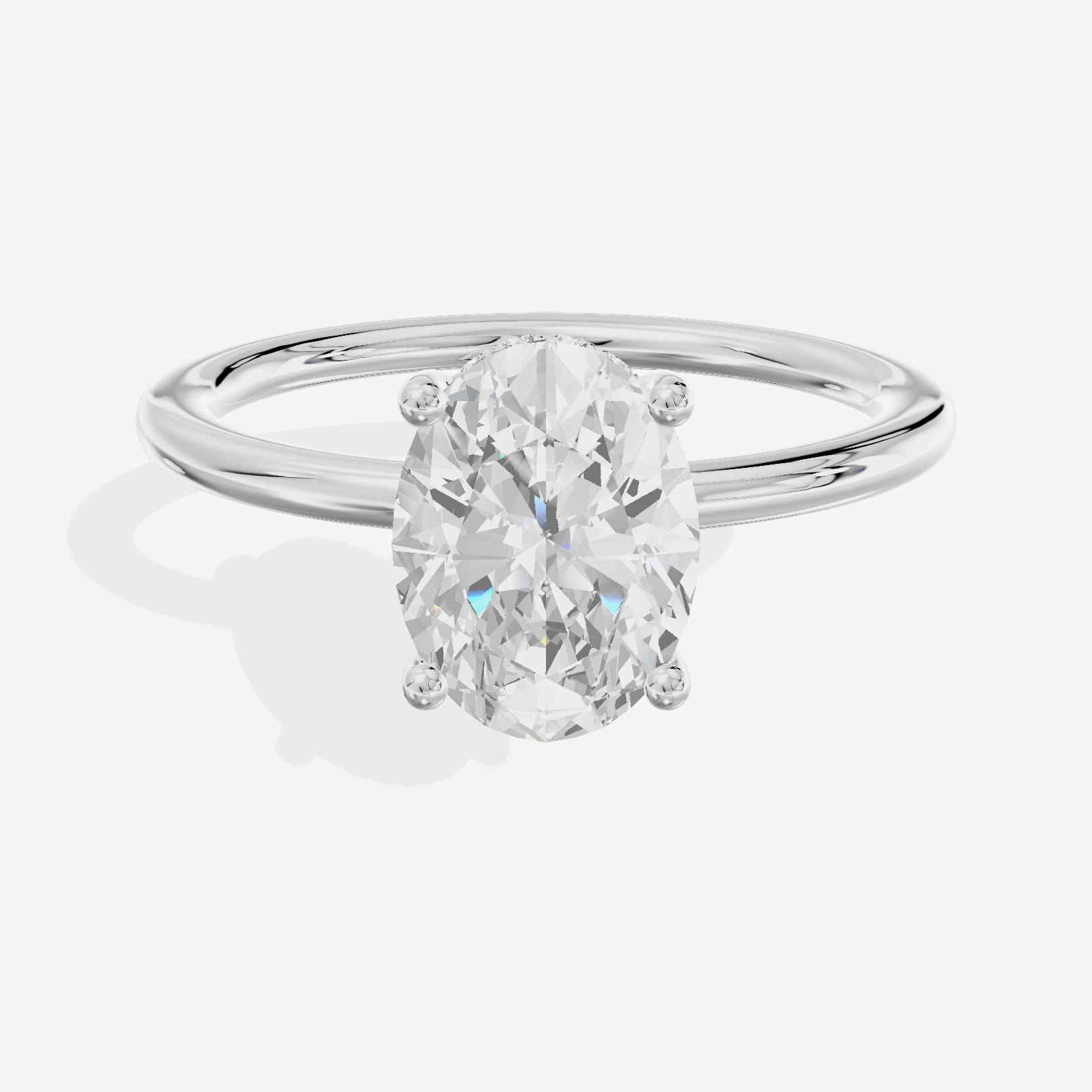 Reverya Hidden Halo Oval Engagement Ring (1/20 ct. tw.) in 18K White Gold