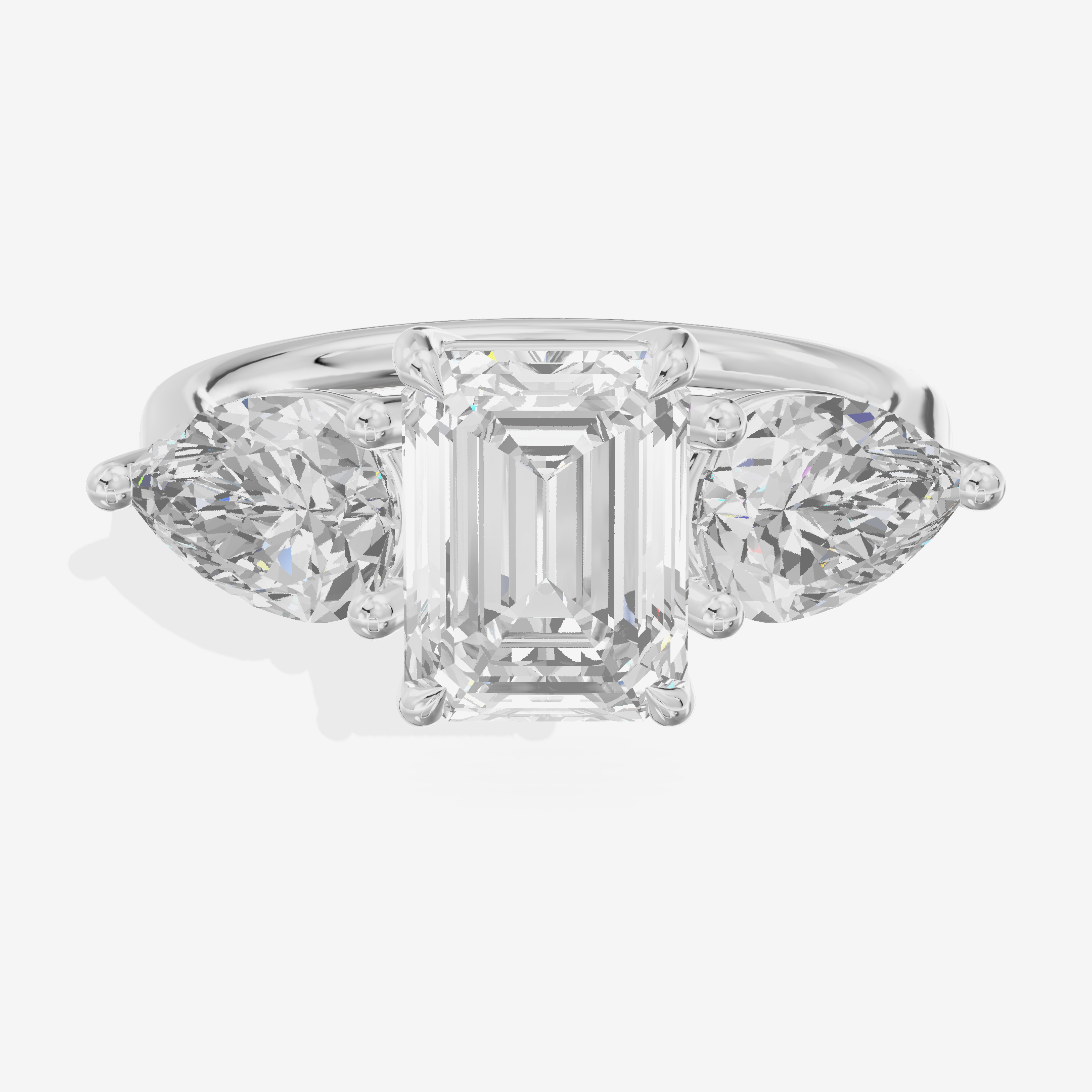 Luxe Heartline Three Stone Emerald Engagement Ring (3/4 ct. tw.) in Platinum