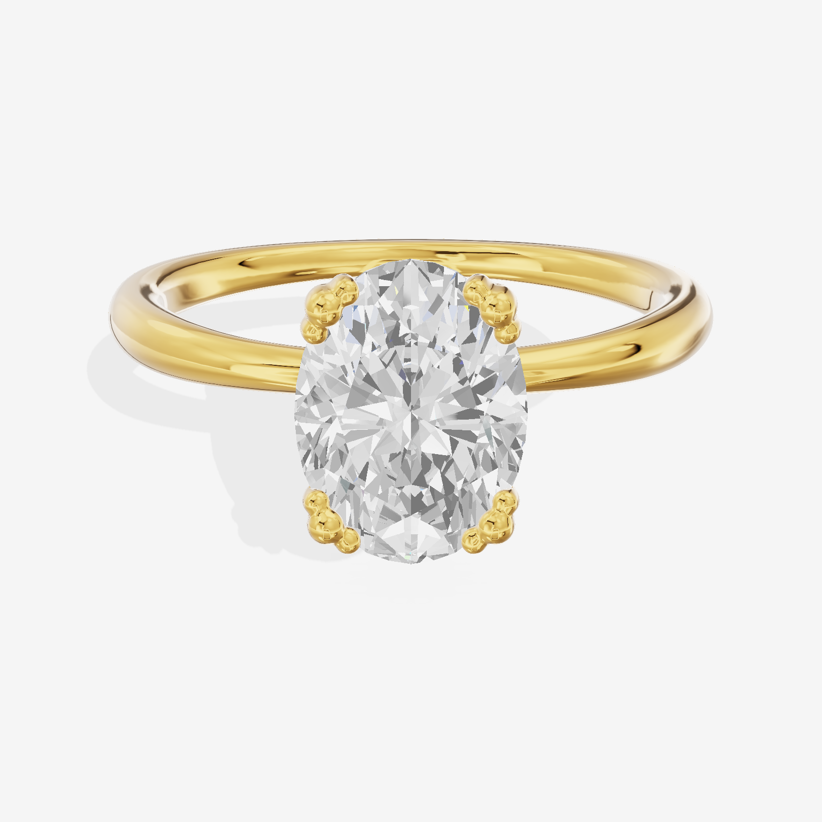 Classic Tender Oval Solitaire Engagement Ring in 18K Yellow Gold