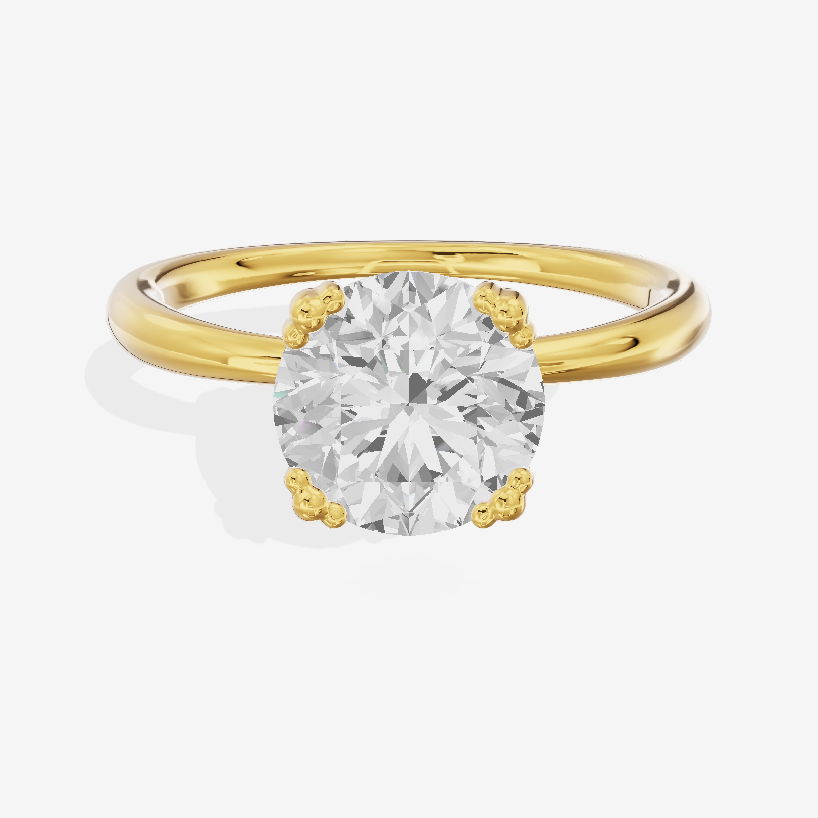 Classic Tender Round Solitaire Engagement Ring in 18K Yellow Gold