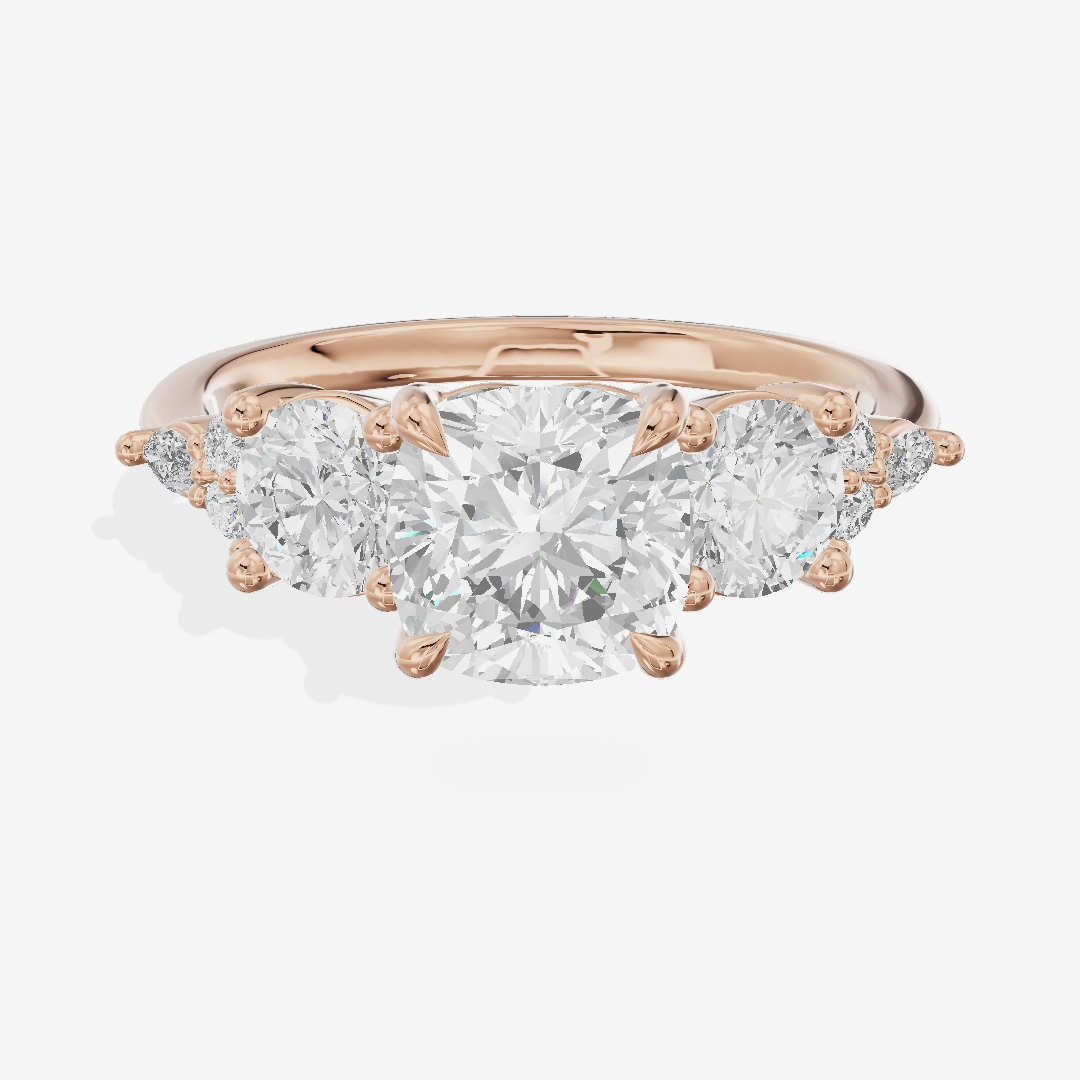 Luxe Halcyon Three Stone Cushion Engagement Ring (3/4 ct. tw.) in 18K Rose Gold