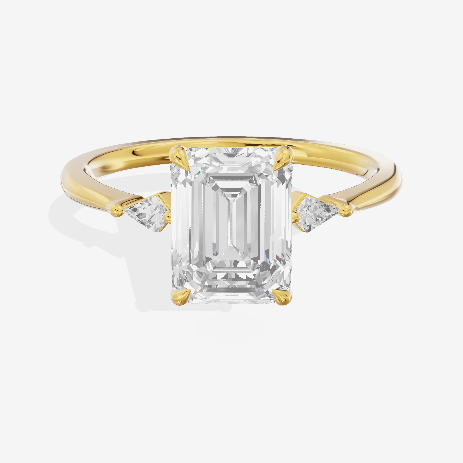 Petite Triade Emerald Three Stone Engagement Ring (1/15 ct. tw.) in 18K Yellow Gold