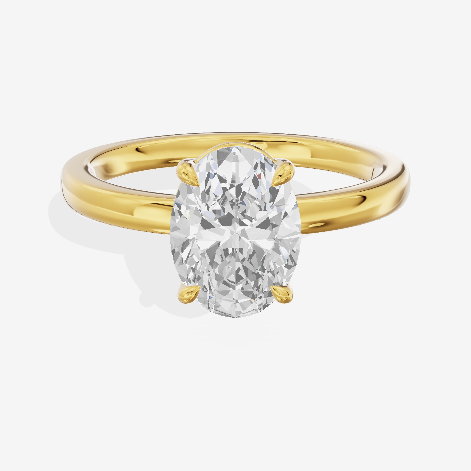 Heartline 2mm Oval Solitaire Engagement Ring in 18K Yellow Gold