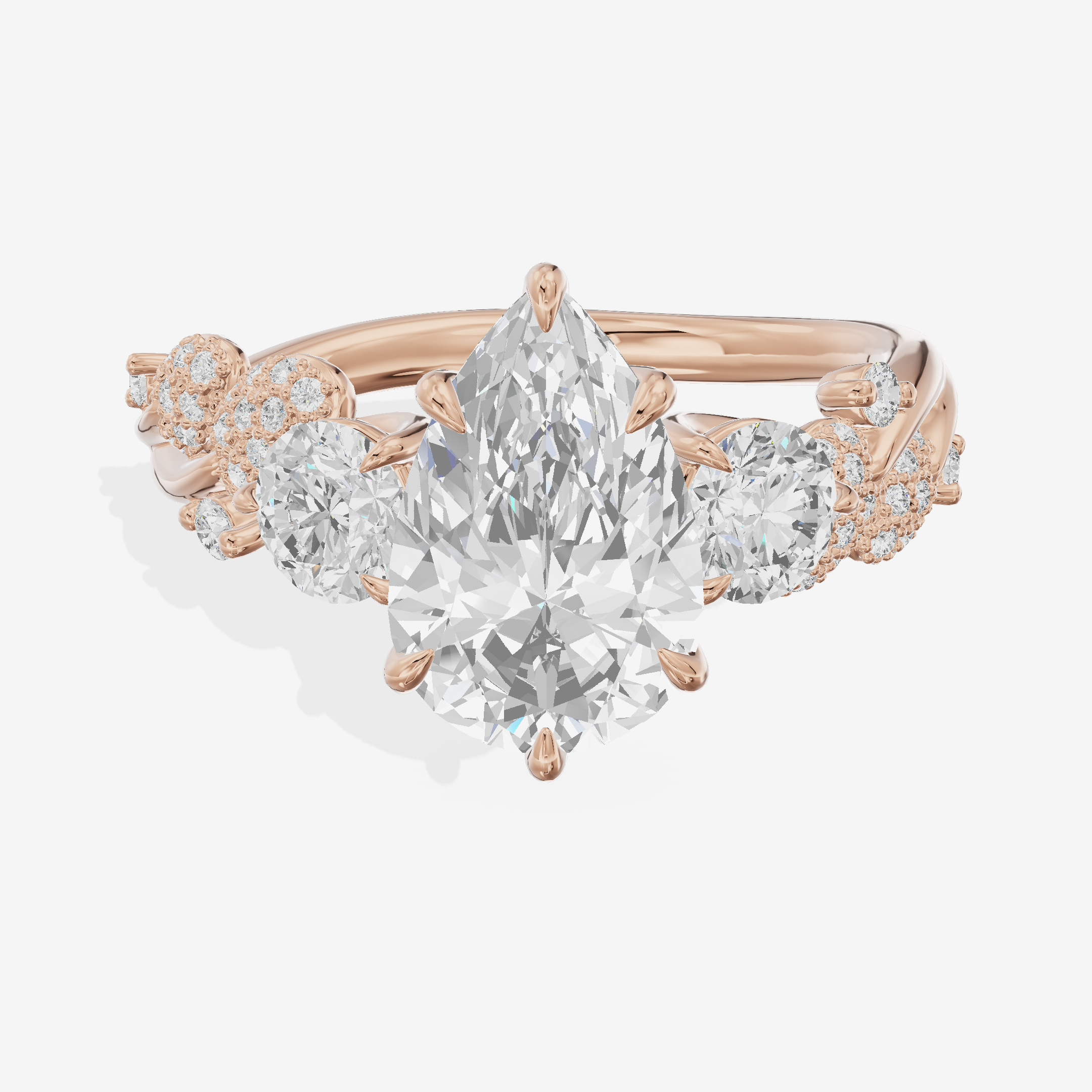 Modern Coeurine Three Stone Pear Engagement Ring (1/2 ct. tw.) in 18K Rose Gold
