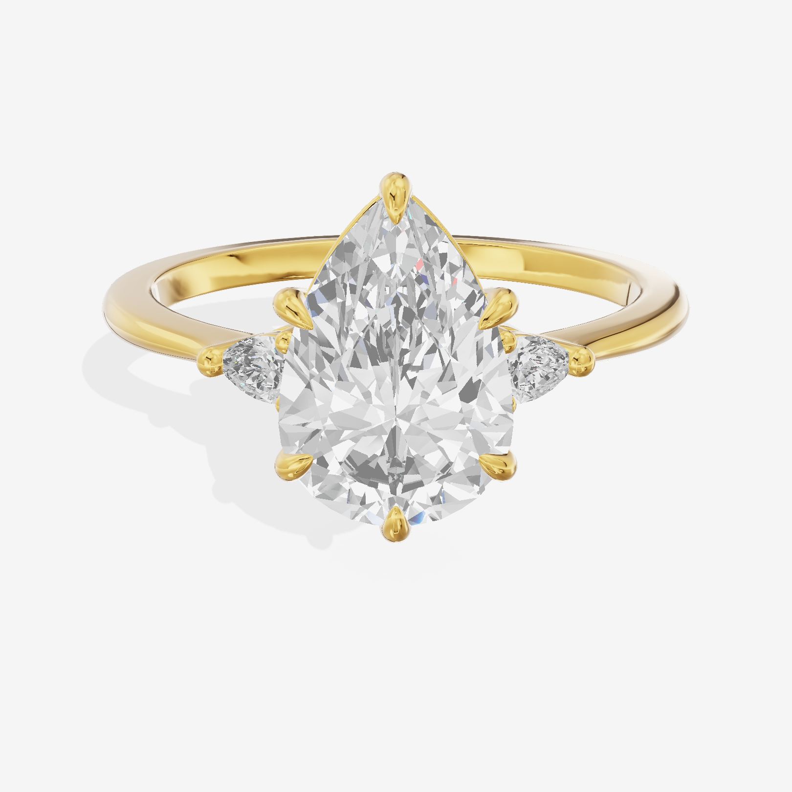 Clusta Three Stone Pear Engagement Ring (1/10 ct. tw.) in 18K Yellow Gold