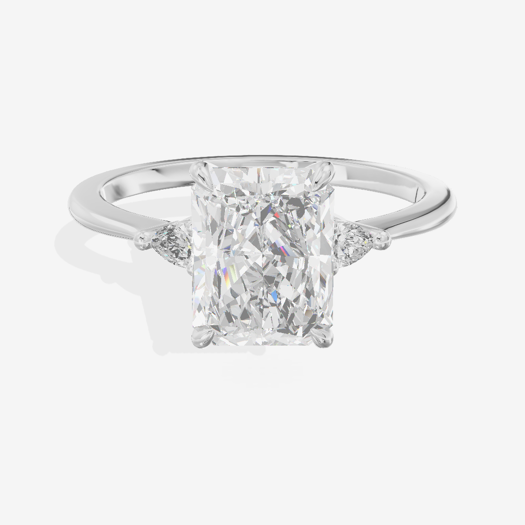 Clusta Three Stone Radiant Engagement Ring (1/10 ct. tw.) in Platinum