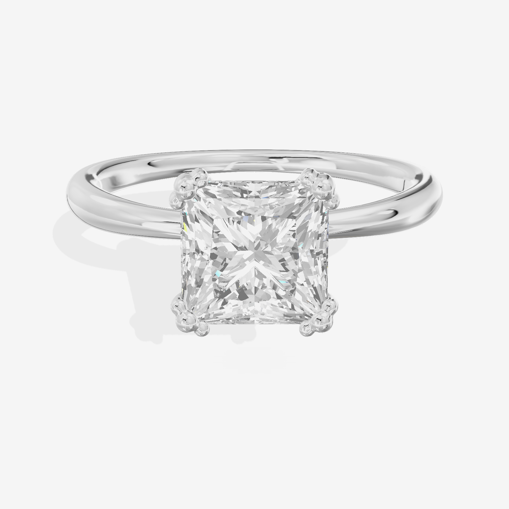 Classic Tender Princess Solitaire Engagement Ring in Platinum