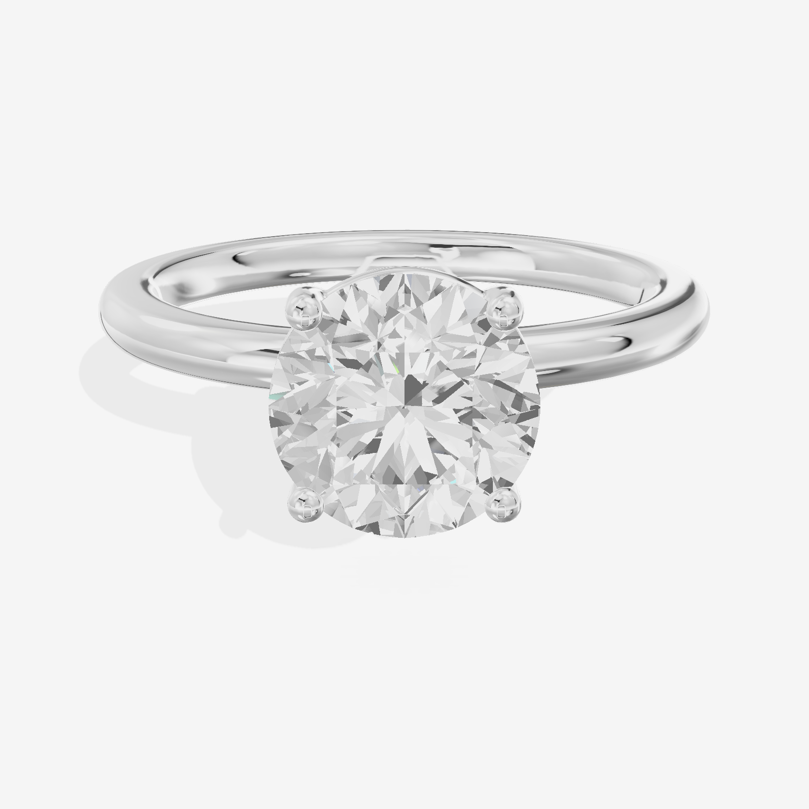 Tender 2mm Round Solitaire Engagement Ring in 14K White Gold