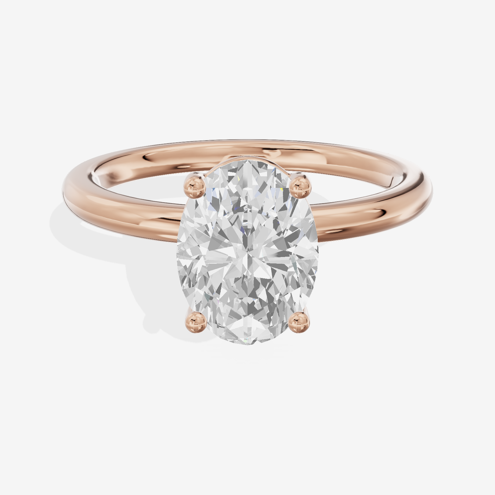 Tender 2mm Oval Solitaire Engagement Ring in 18K Rose Gold