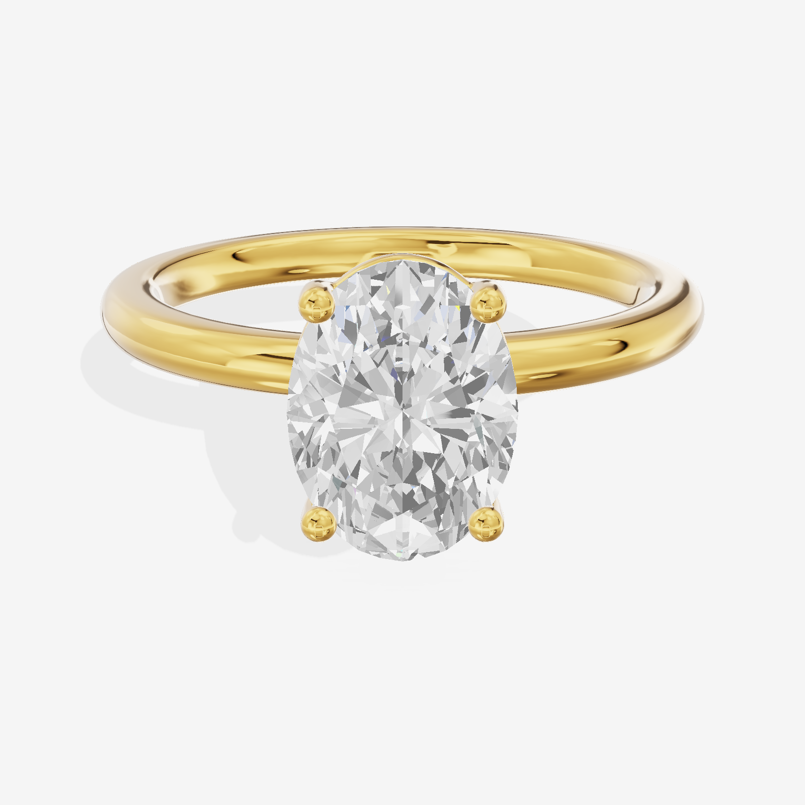 Tender 2mm Oval Solitaire Engagement Ring in 14K Yellow Gold