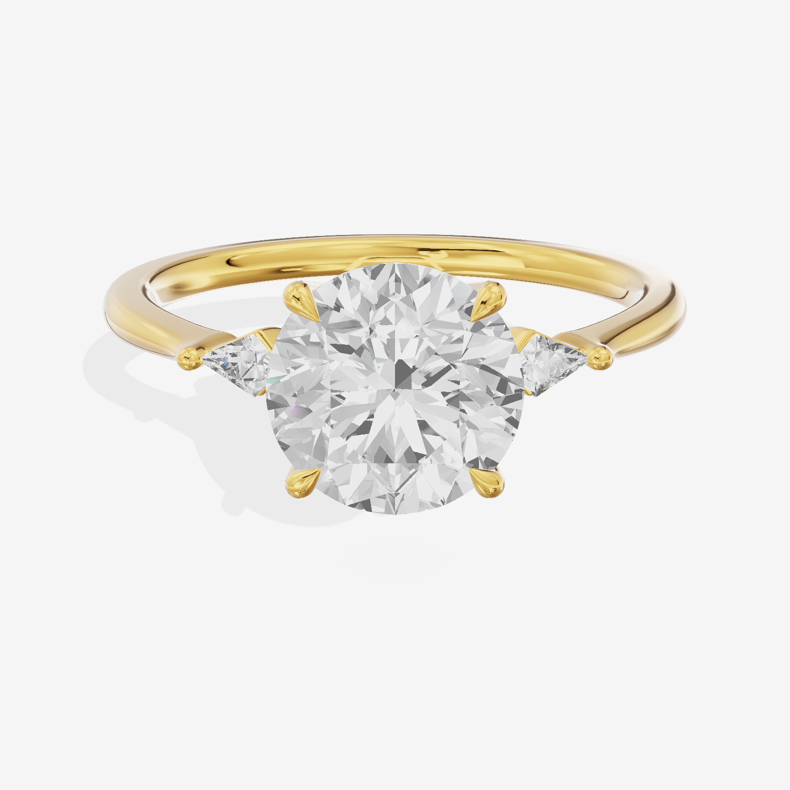 Petite Triade Round Three Stone Engagement Ring (1/15 ct. tw.) in 14K Yellow Gold