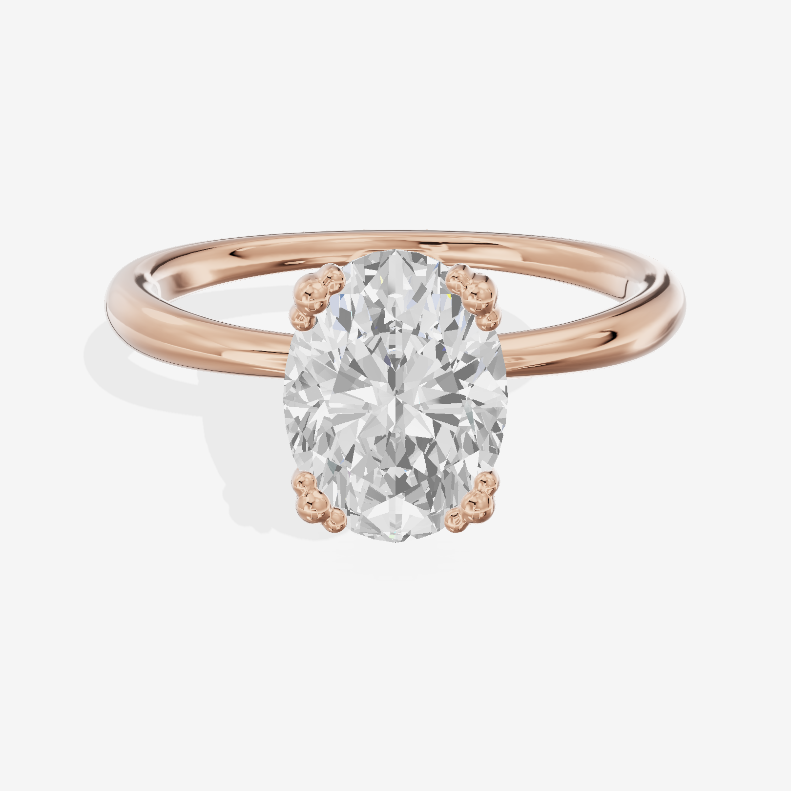 Classic Tender Oval Solitaire Engagement Ring in 18K Rose Gold