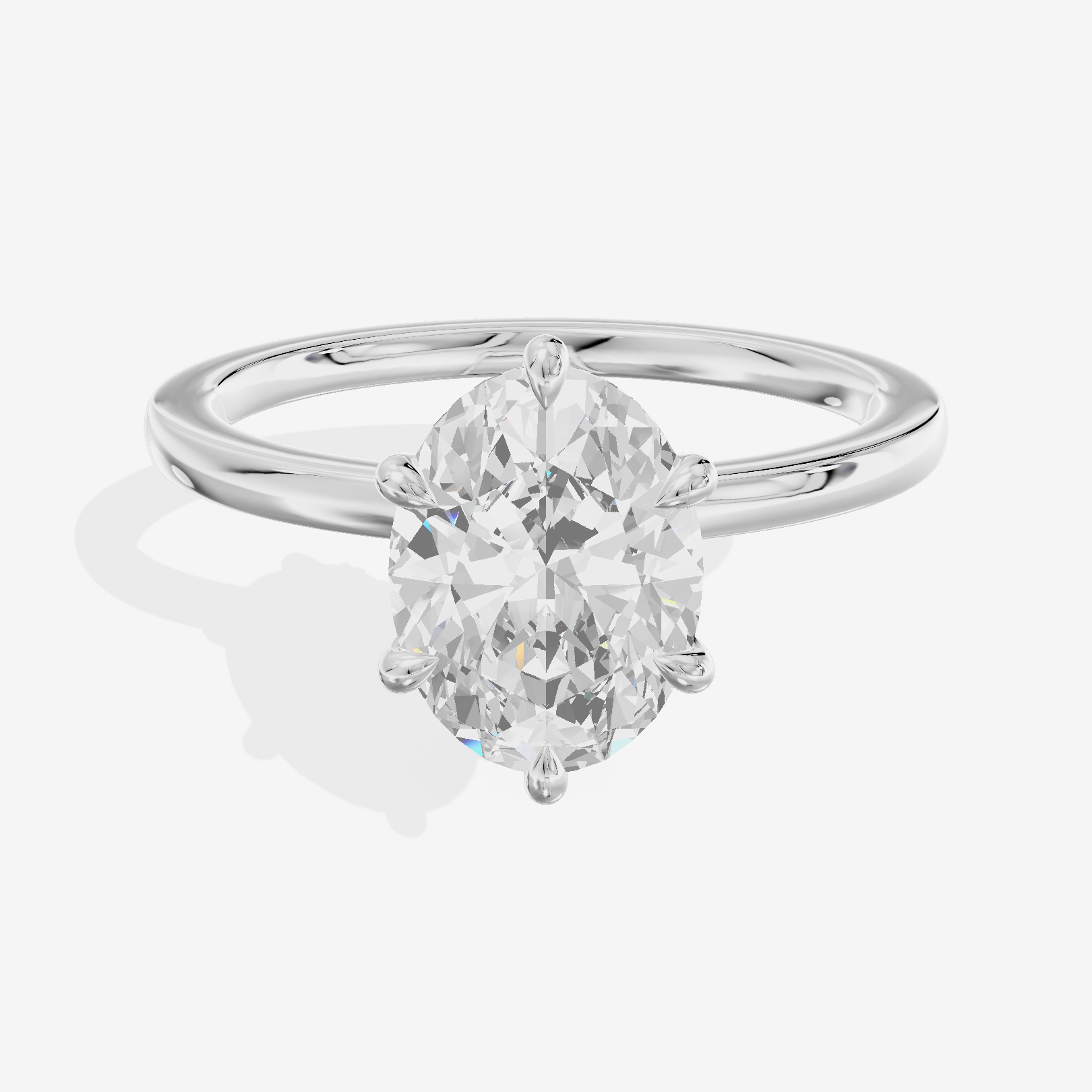 Coeurine Halo Oval Engagement Ring (1/5 ct. tw.) in 18K White Gold
