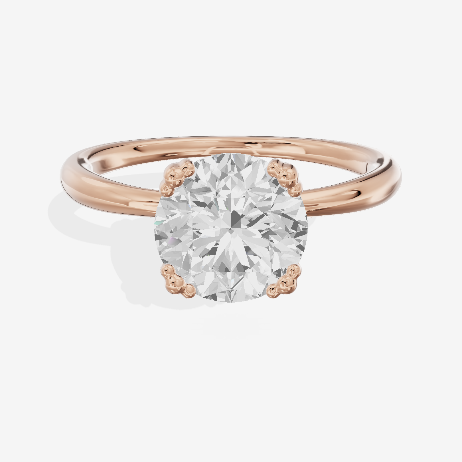 Classic Tender Round Solitaire Engagement Ring in 18K Rose Gold