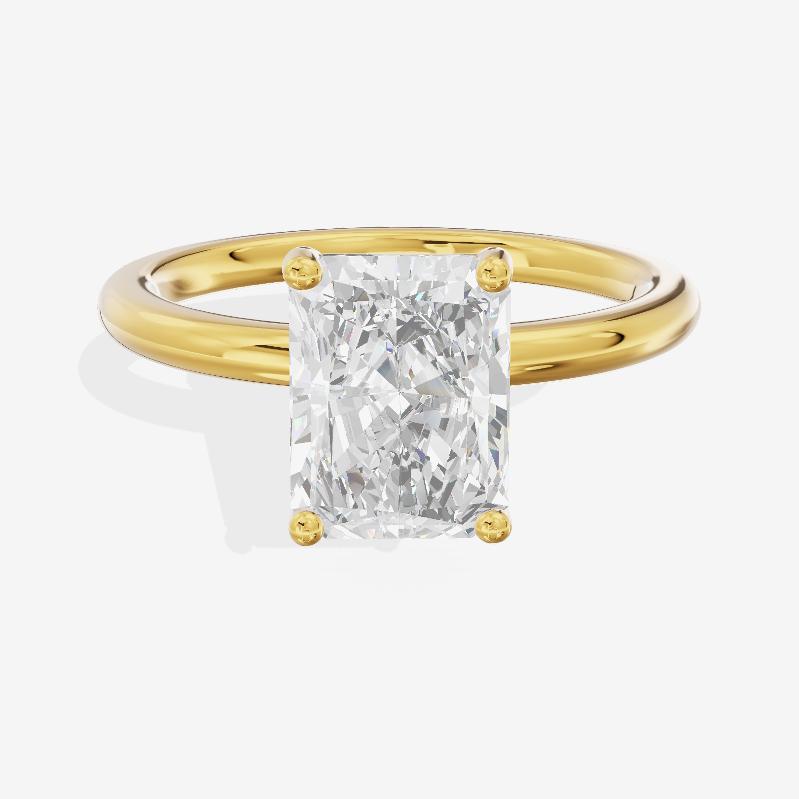 Tender 2mm Radiant Solitaire Engagement Ring in 14K Yellow Gold