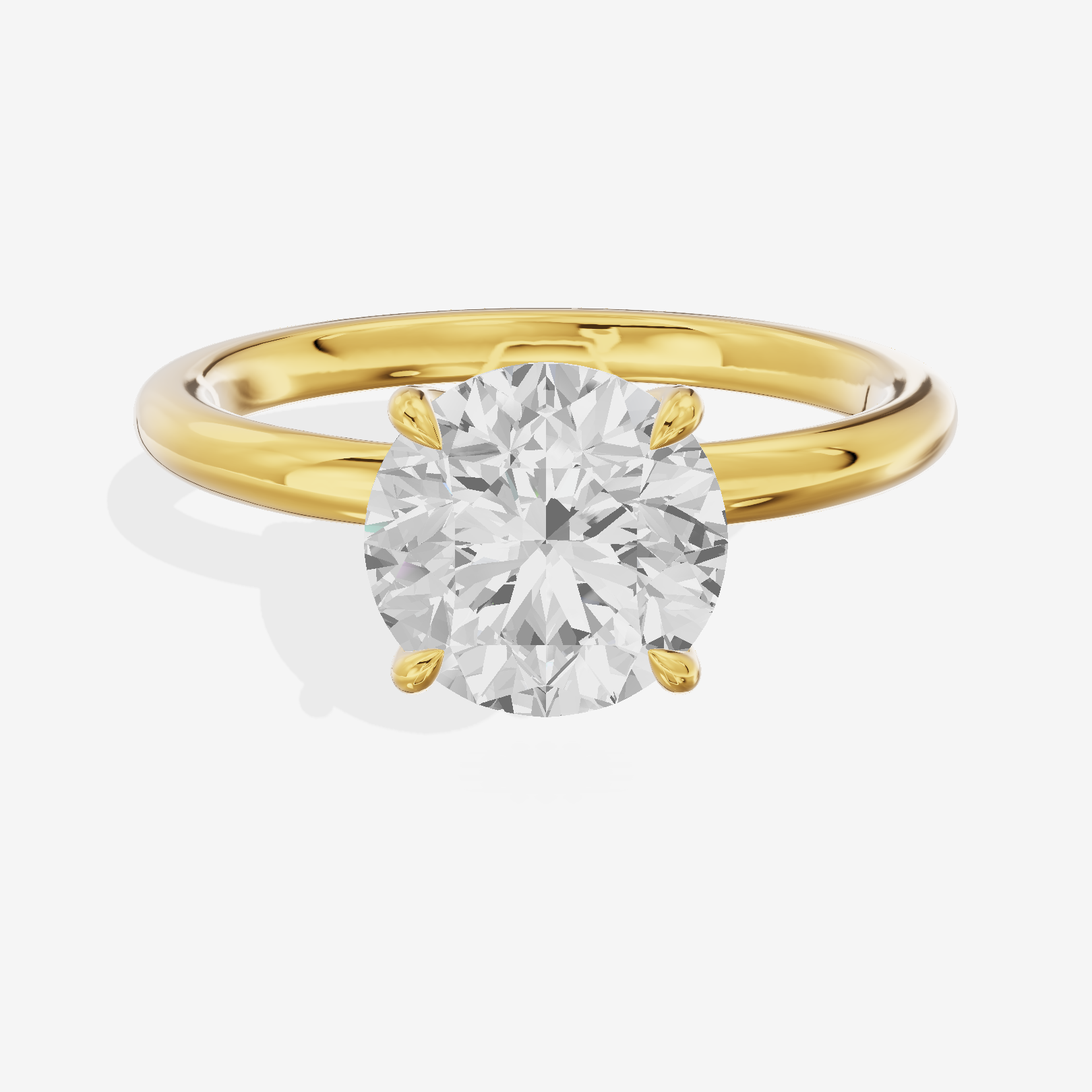 Adorae Solitaire 2mm Round Engagement Ring in 18K Yellow Gold