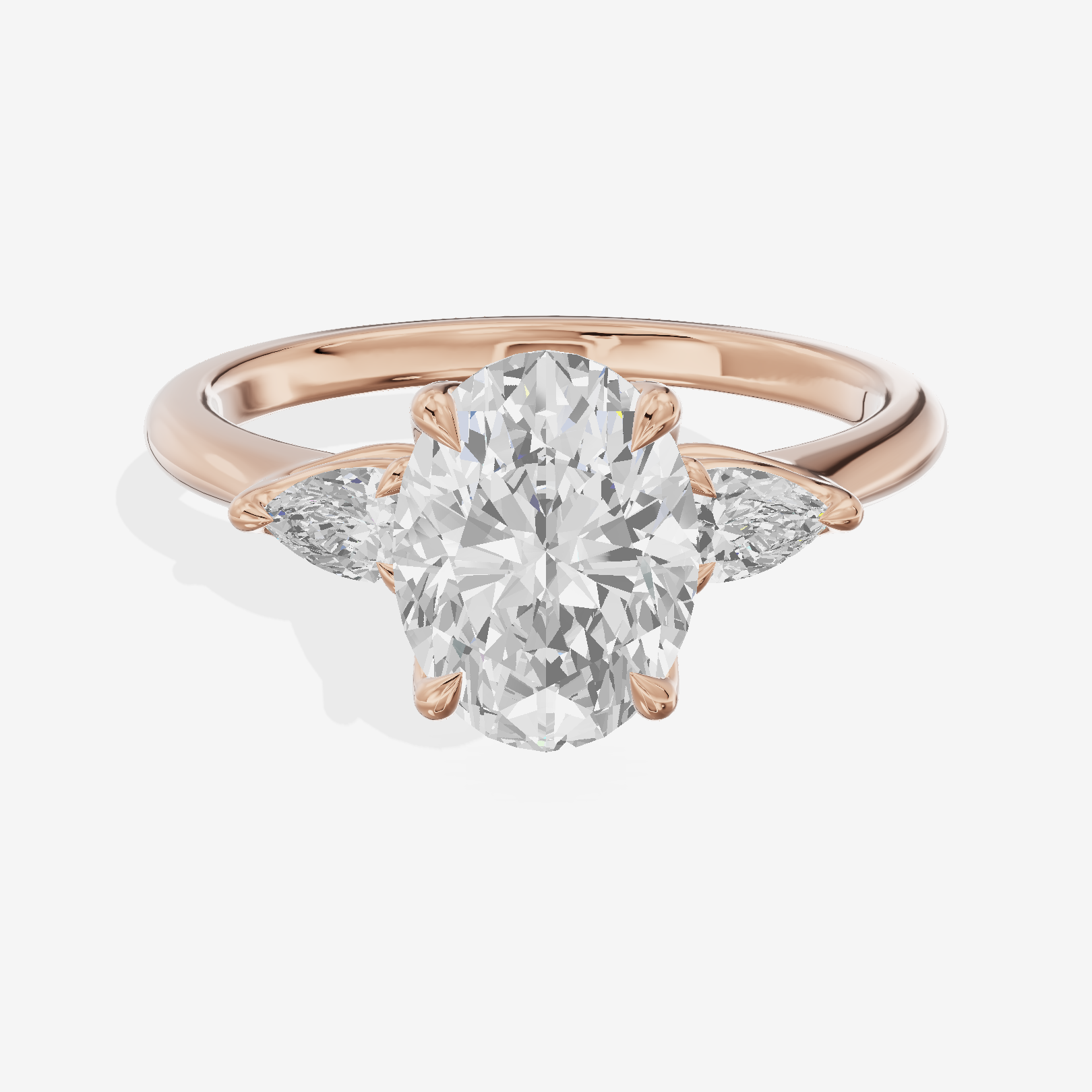 Petite Coeurine Three Stone Oval Engagement Ring (1/5 ct. tw.) in 18K Rose Gold