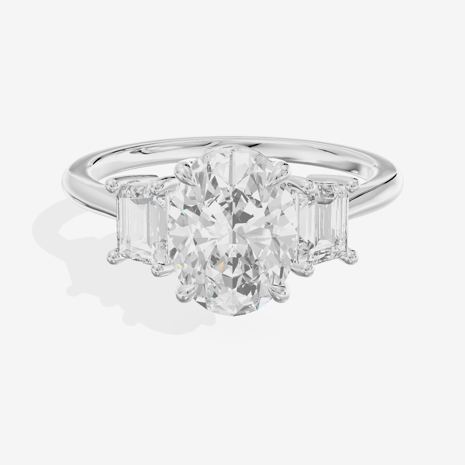 Triade Side Stone Oval Three Stone Engagement Ring (2/5 ct. tw.) in Platinum