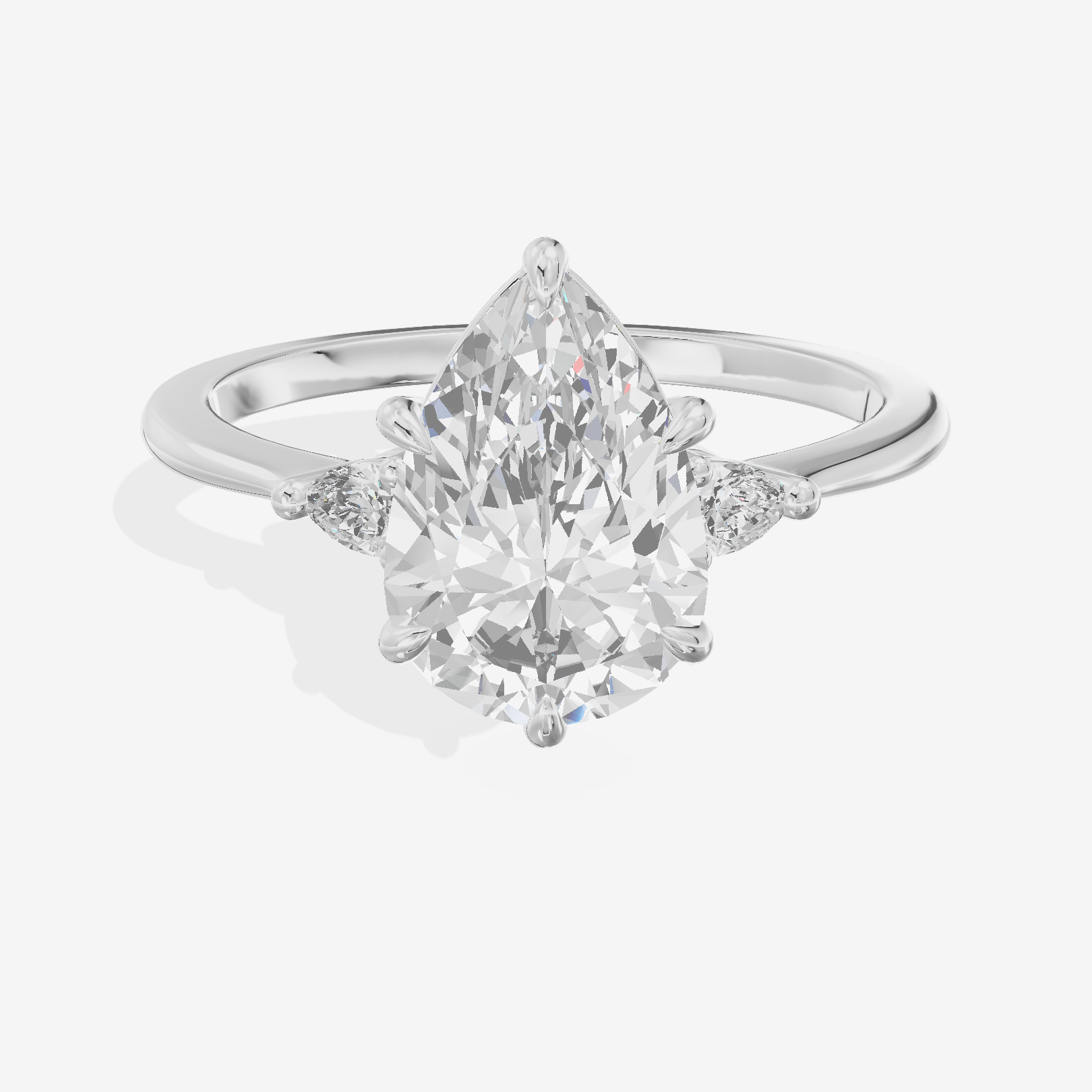 Clusta Three Stone Pear Engagement Ring (1/10 ct. tw.) in 18K White Gold