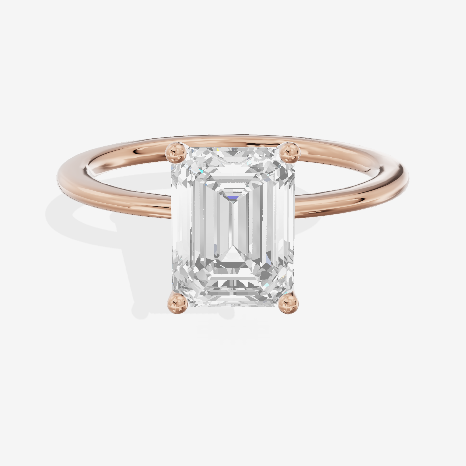 Whispered Promezza 1.4mm Emerald Solitaire Engagement Ring in 18K Rose Gold