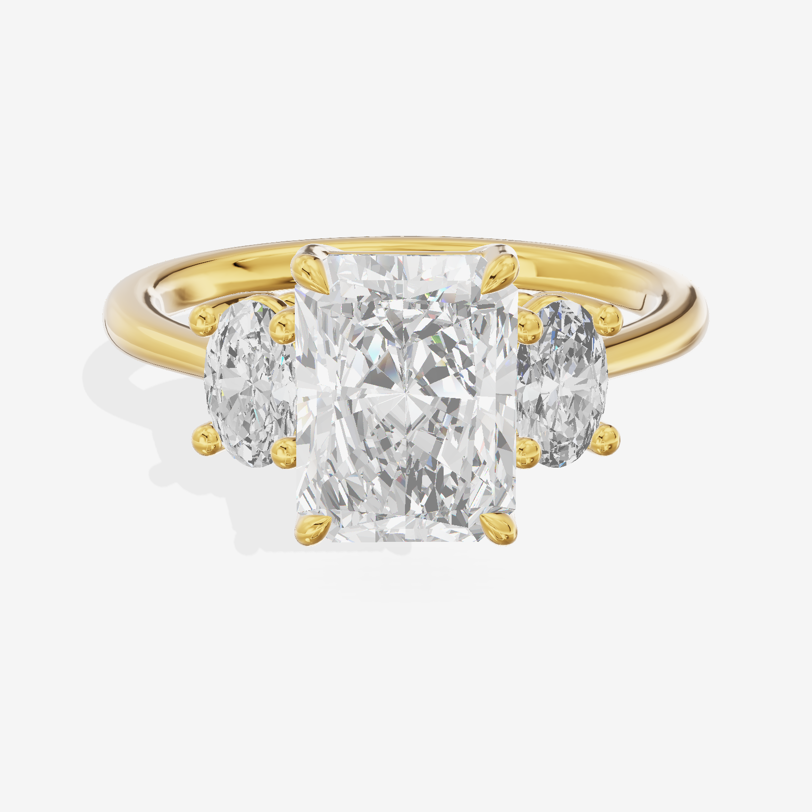 Modern Coeurine Three Stone Radiant Engagement Ring (1/2 ct. tw.) in 18K Yellow Gold