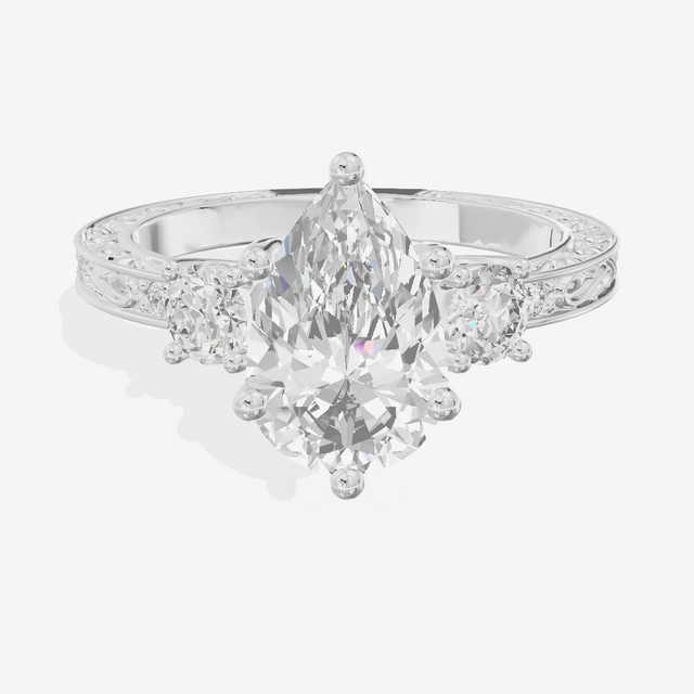 Triade Engraved Pear Three Stone Engagement Ring (1/3 ct. tw.) in Platinum
