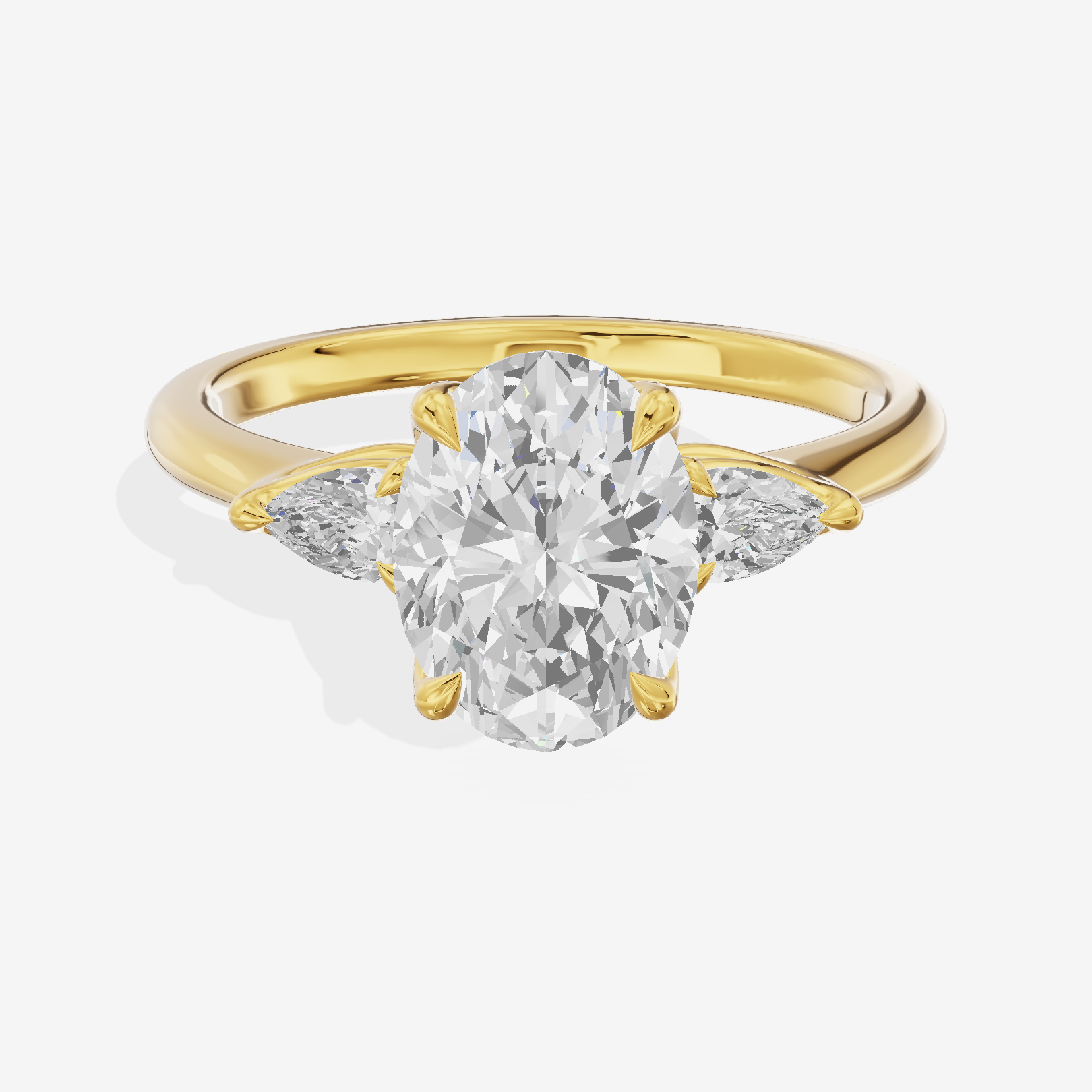 Petite Coeurine Three Stone Oval Engagement Ring (1/5 ct. tw.) in 14K Yellow Gold
