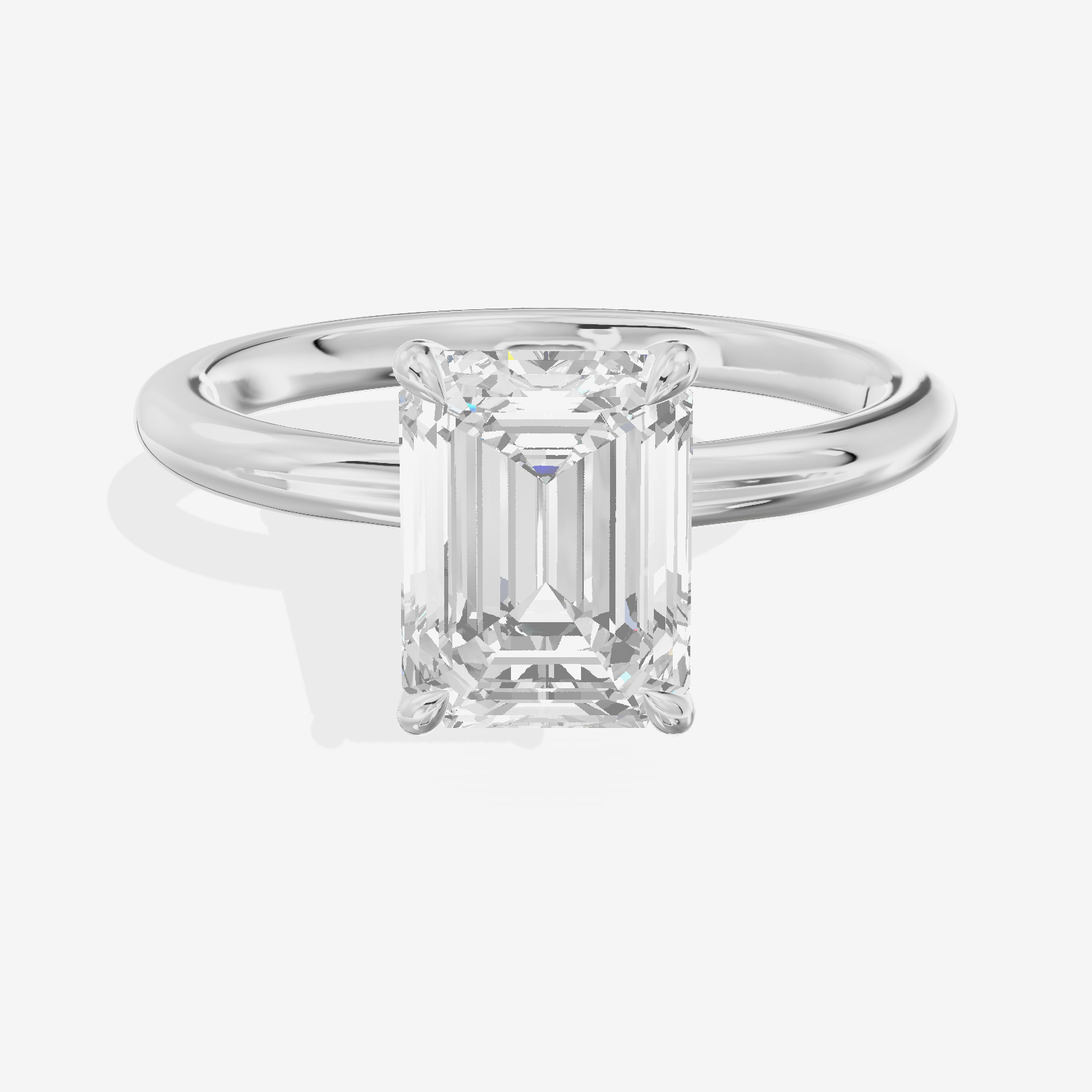 Adorae Solitaire 2mm Emerald Engagement Ring in Platinum