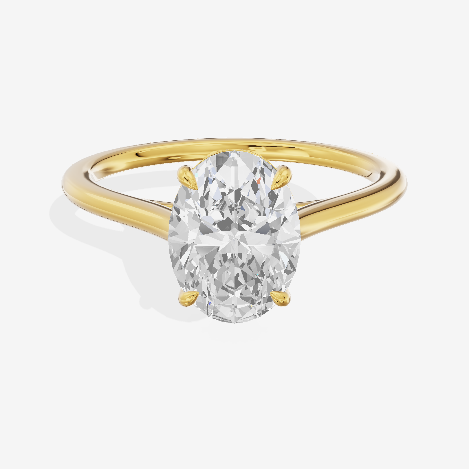 One of One 1.4mm Oval Solitaire Engagement Ring in 14K Yellow Gold