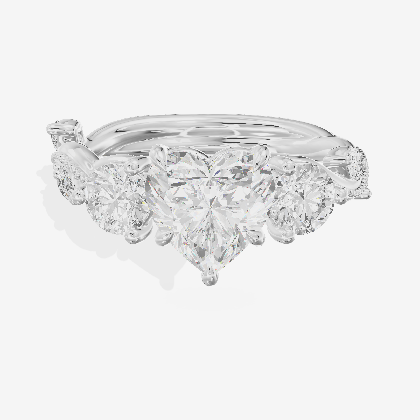 Triade Heart Three Stone Engagement Ring (1/10 ct. tw.) in Platinum