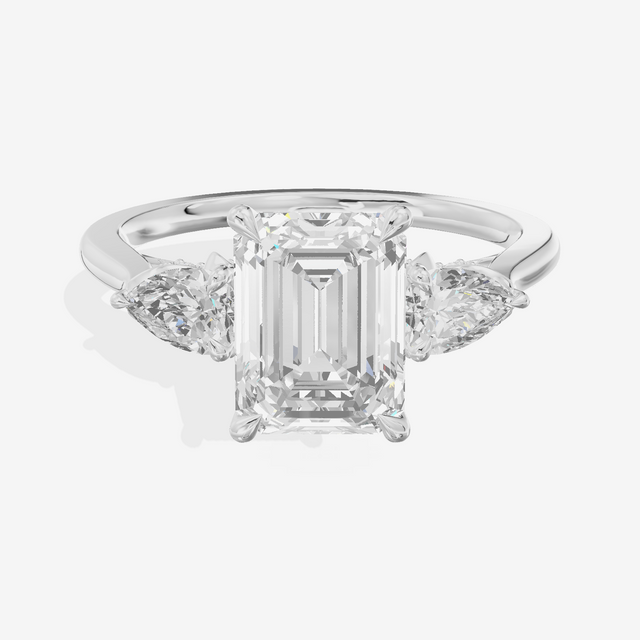 Modern Sincere Three Stone Emerald Engagement Ring (1/2 ct. tw.) in Platinum