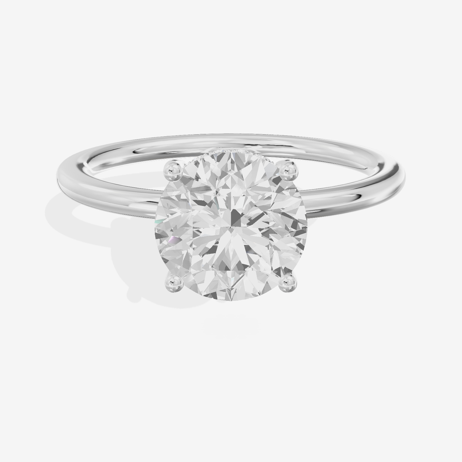 Reverya Hidden Halo Round Engagement Ring (1/20 ct. tw.) in 18K White Gold