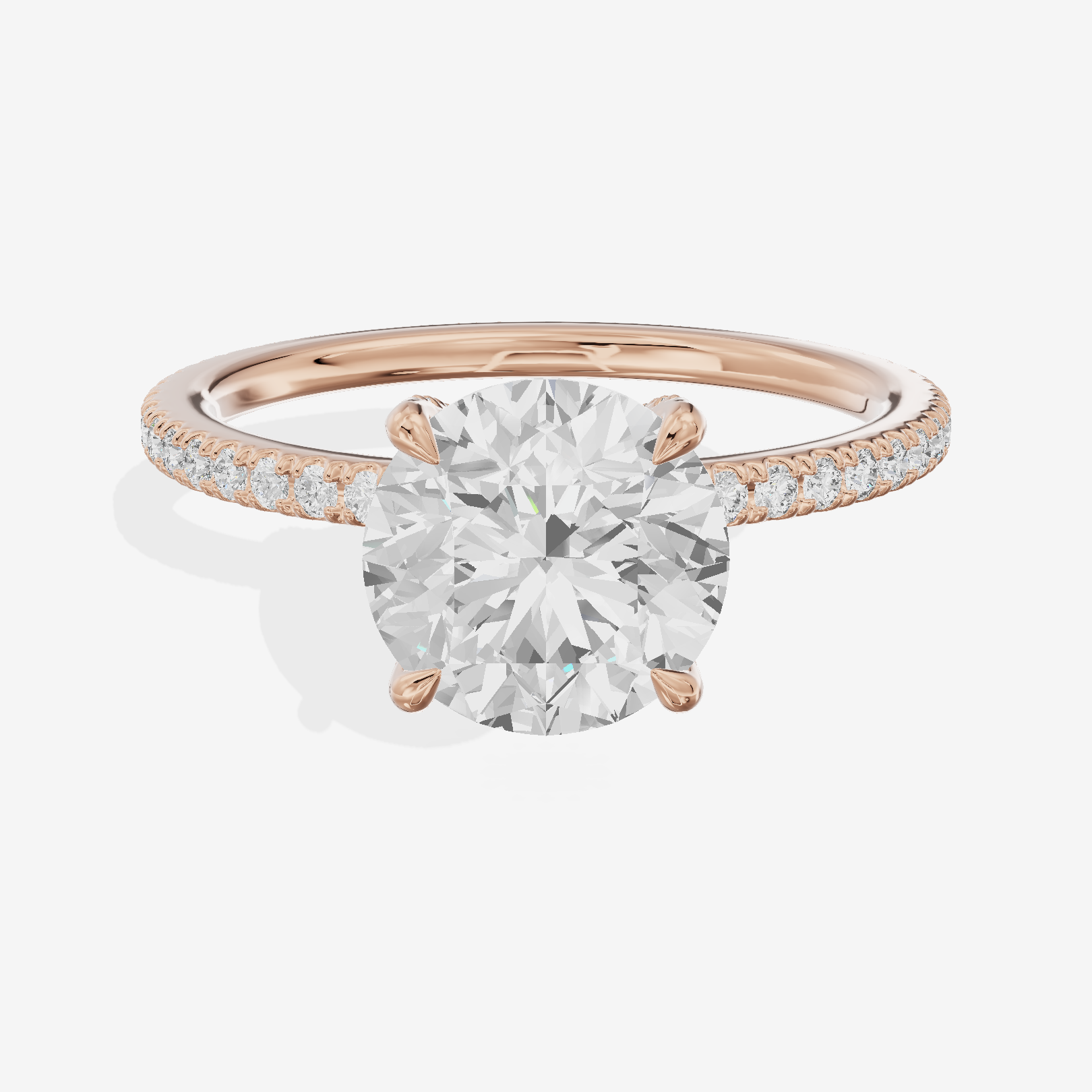 Lustrous Sincere Round Engagement Ring with Side Stones (1/3 ct. tw.) in 18K Rose Gold